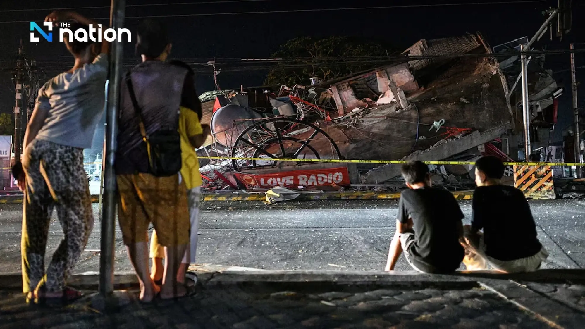 Philippines quake toll reaches 37 as rescuers search collapsed building