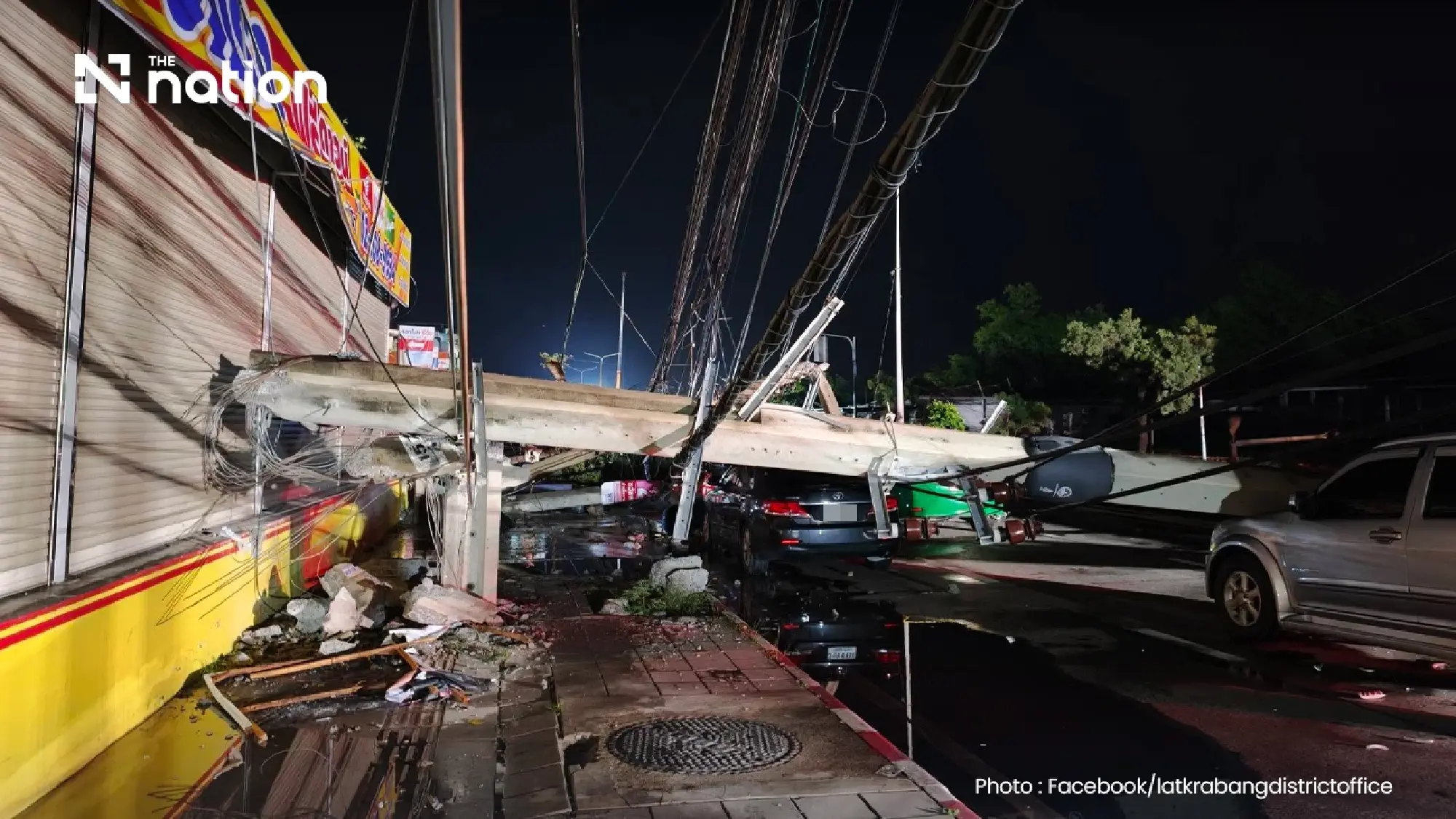 Traffic alert: Chalong Krung road in Lat Krabang is closed after a storm toppled power poles