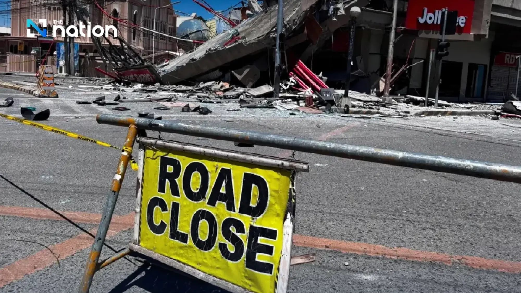 Philippines quake toll reaches 37 as rescuers search collapsed building