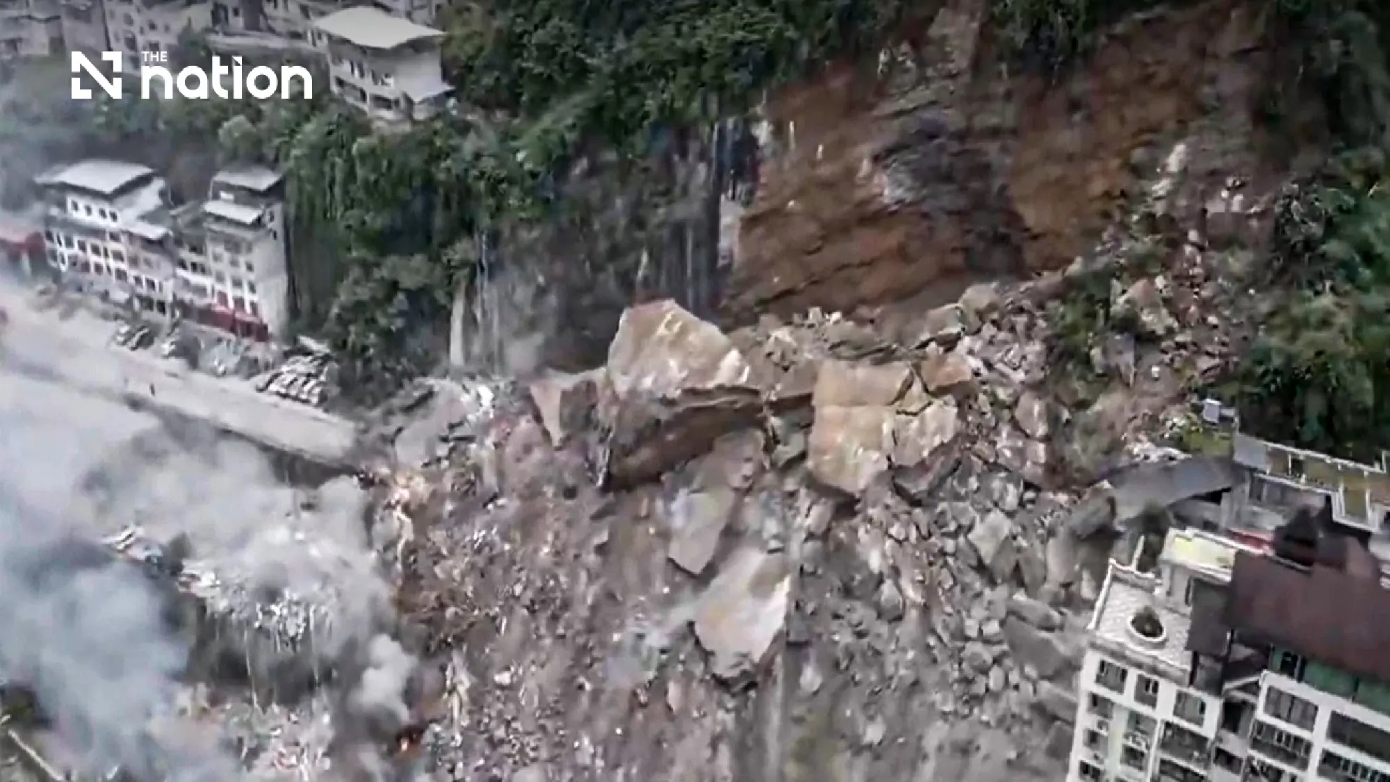 Nine rescued as Chongqing landslide buries homes during evacuation