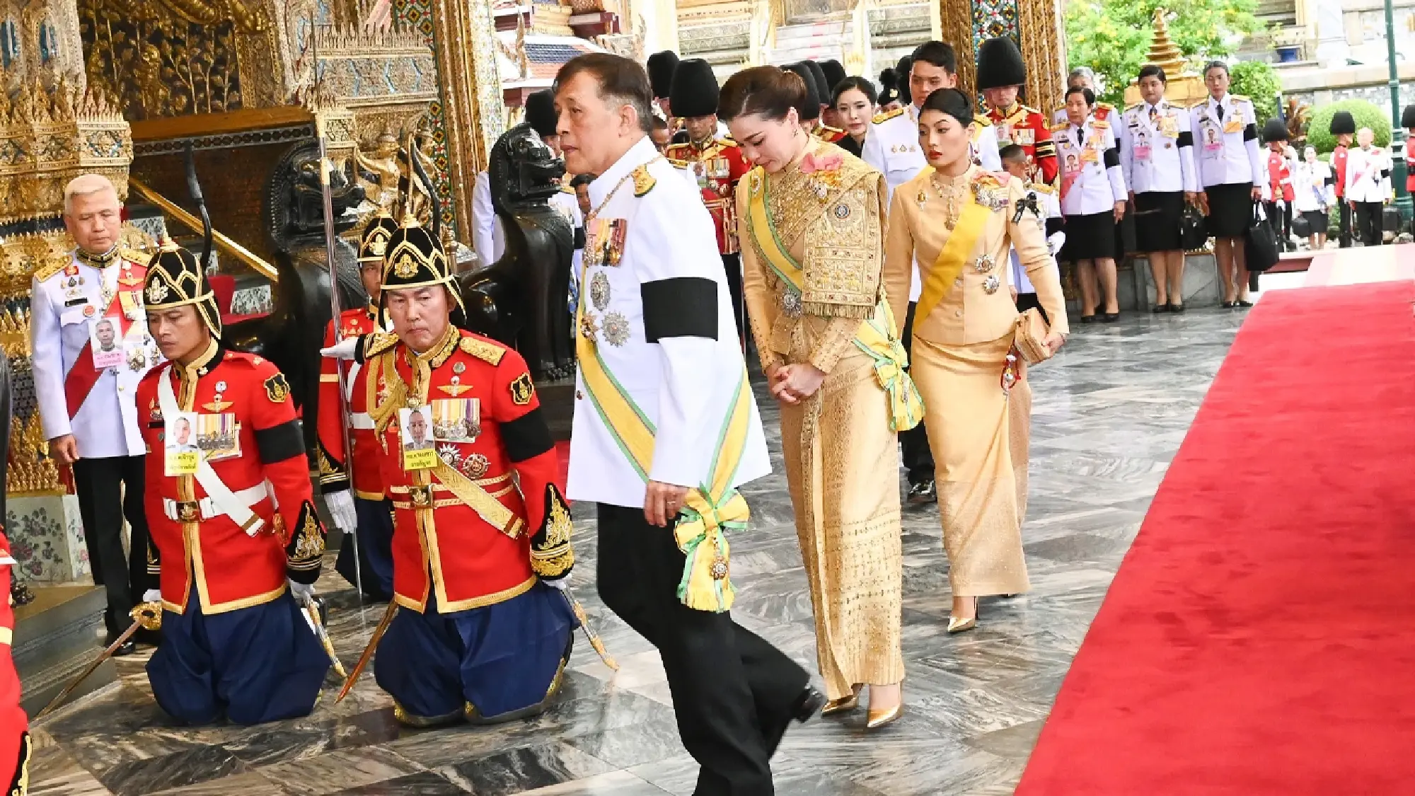 Their Majesties attend King’s birthday rites at Grand Palace