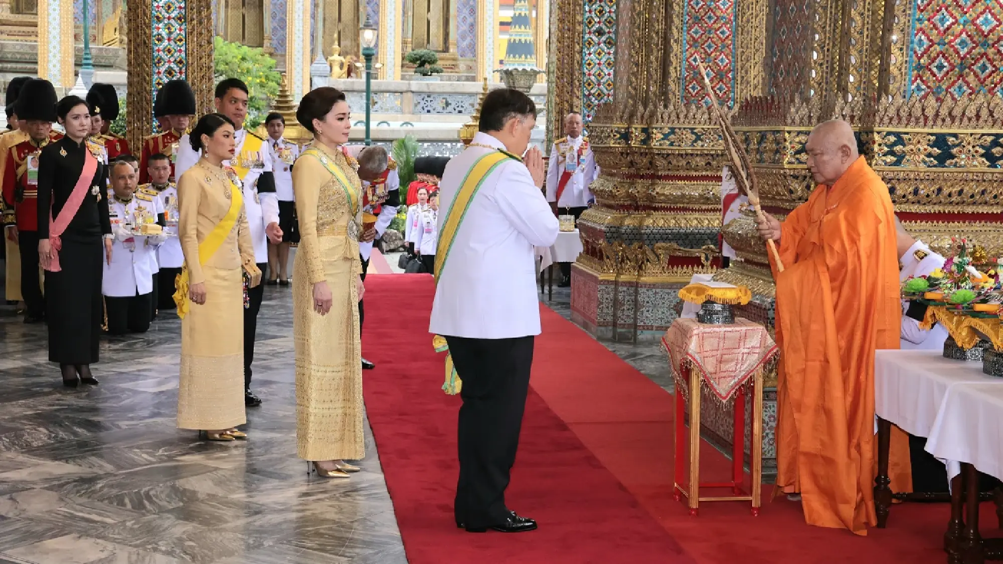 Their Majesties attend King’s birthday rites at Grand Palace