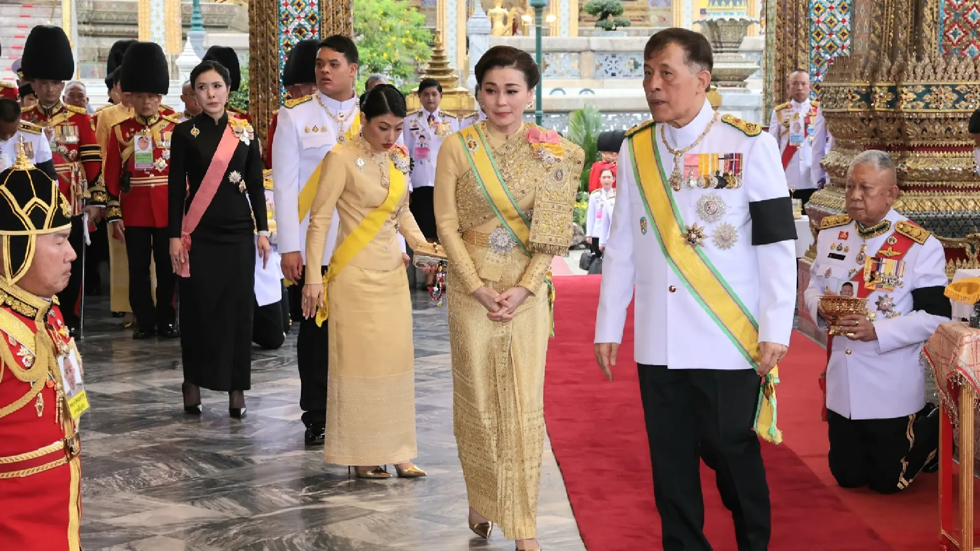 Their Majesties attend King’s birthday rites at Grand Palace
