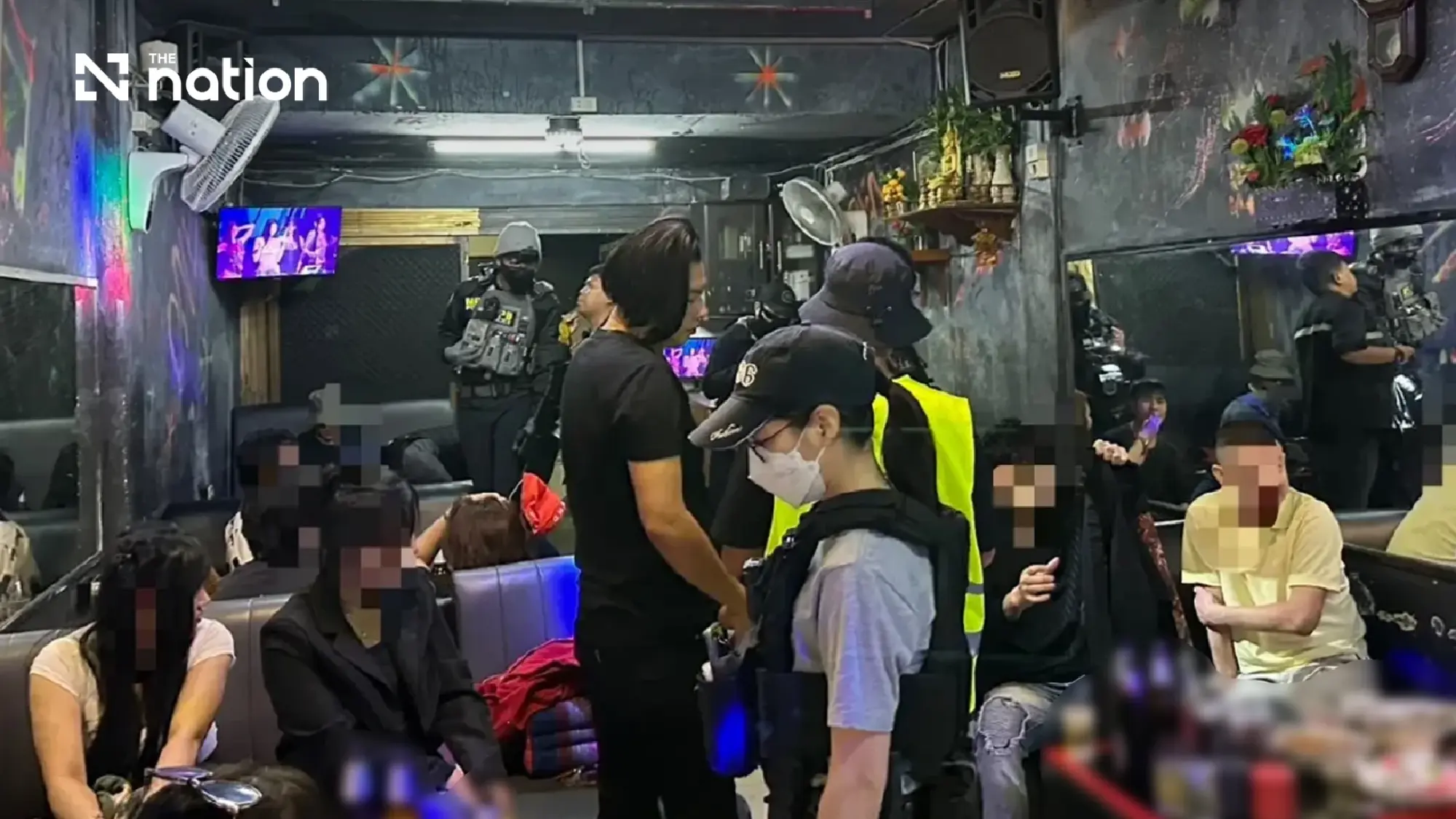 Police raid secret Huai Khwang pub disguised as game shop, find drugs and no fire exit