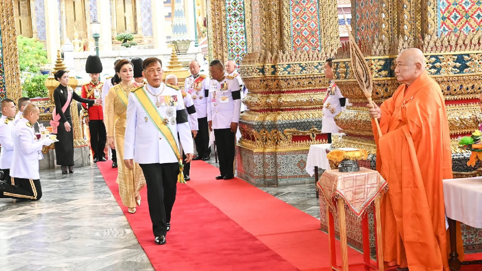 Their Majesties attend King’s birthday rites at Grand Palace