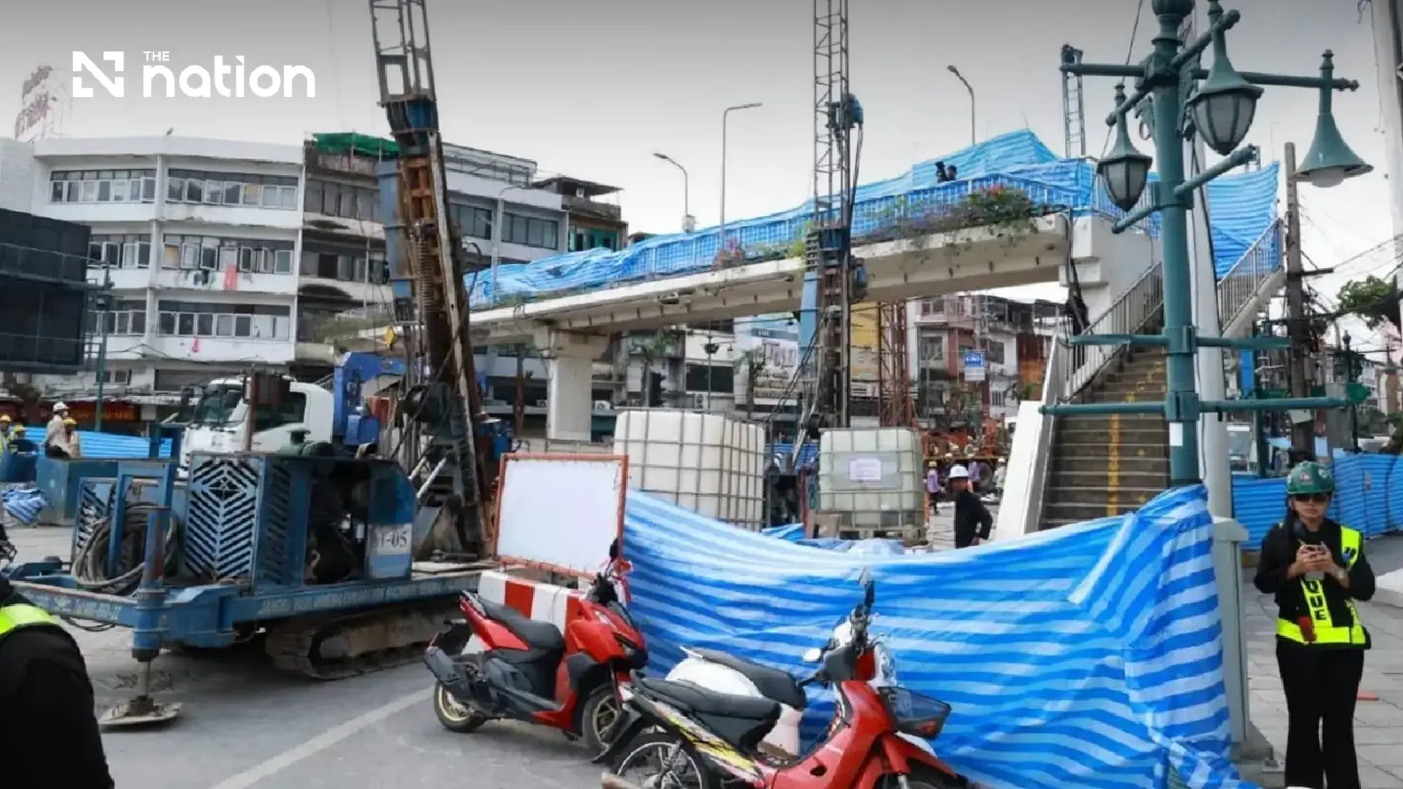 DDPM sends cell broadcast alert to 14 Bangkok districts as Khlong San bans use of unsafe buildings