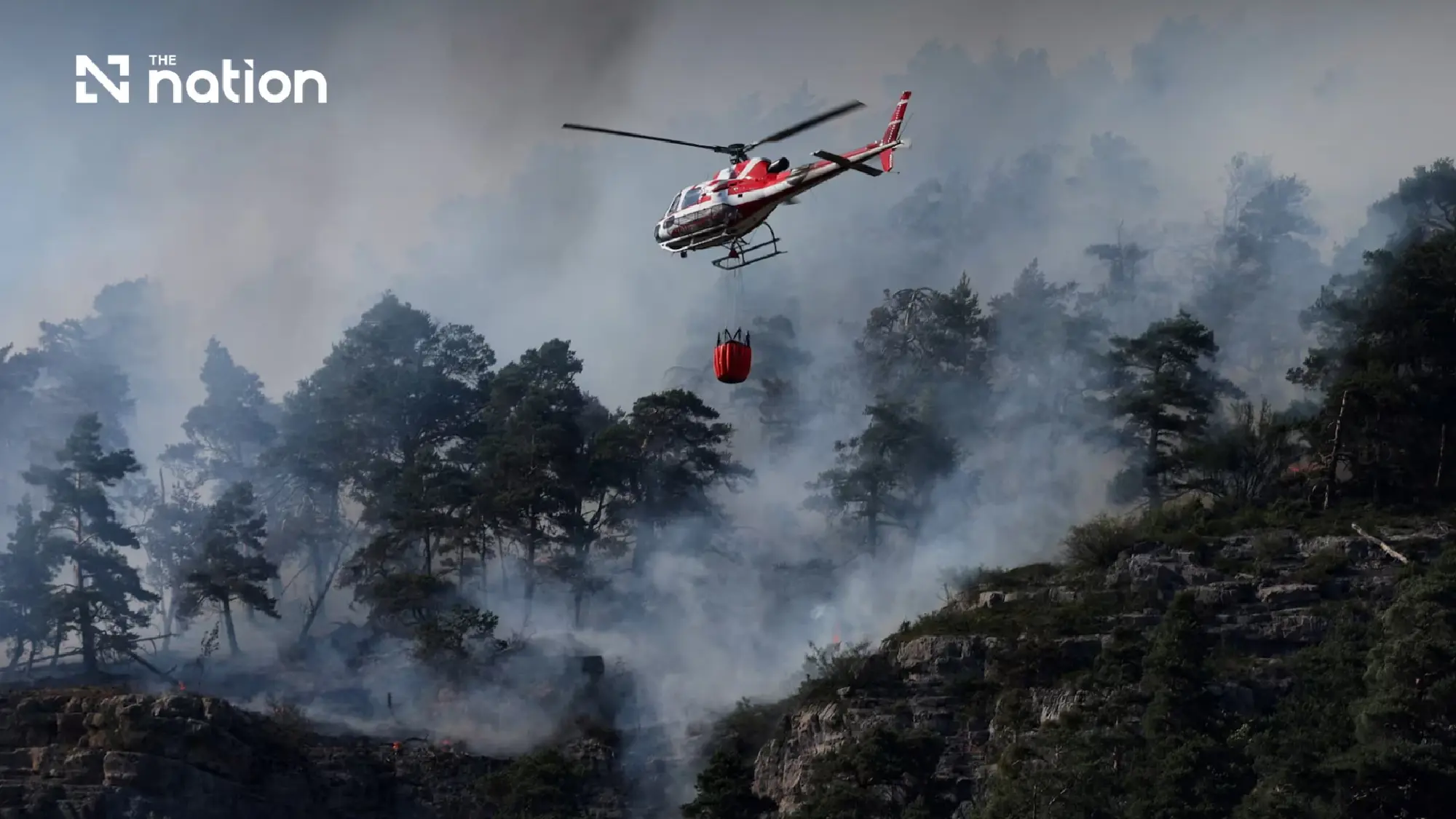 Wildfires force mass evacuations in France and Spain