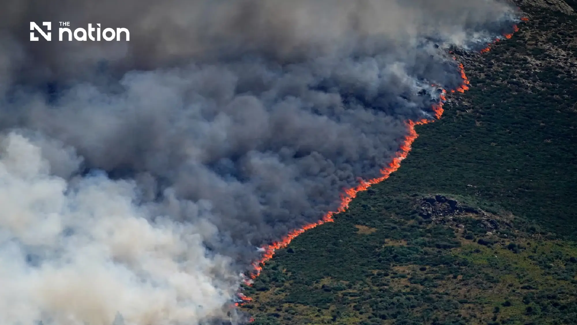 Wildfires force mass evacuations in France and Spain