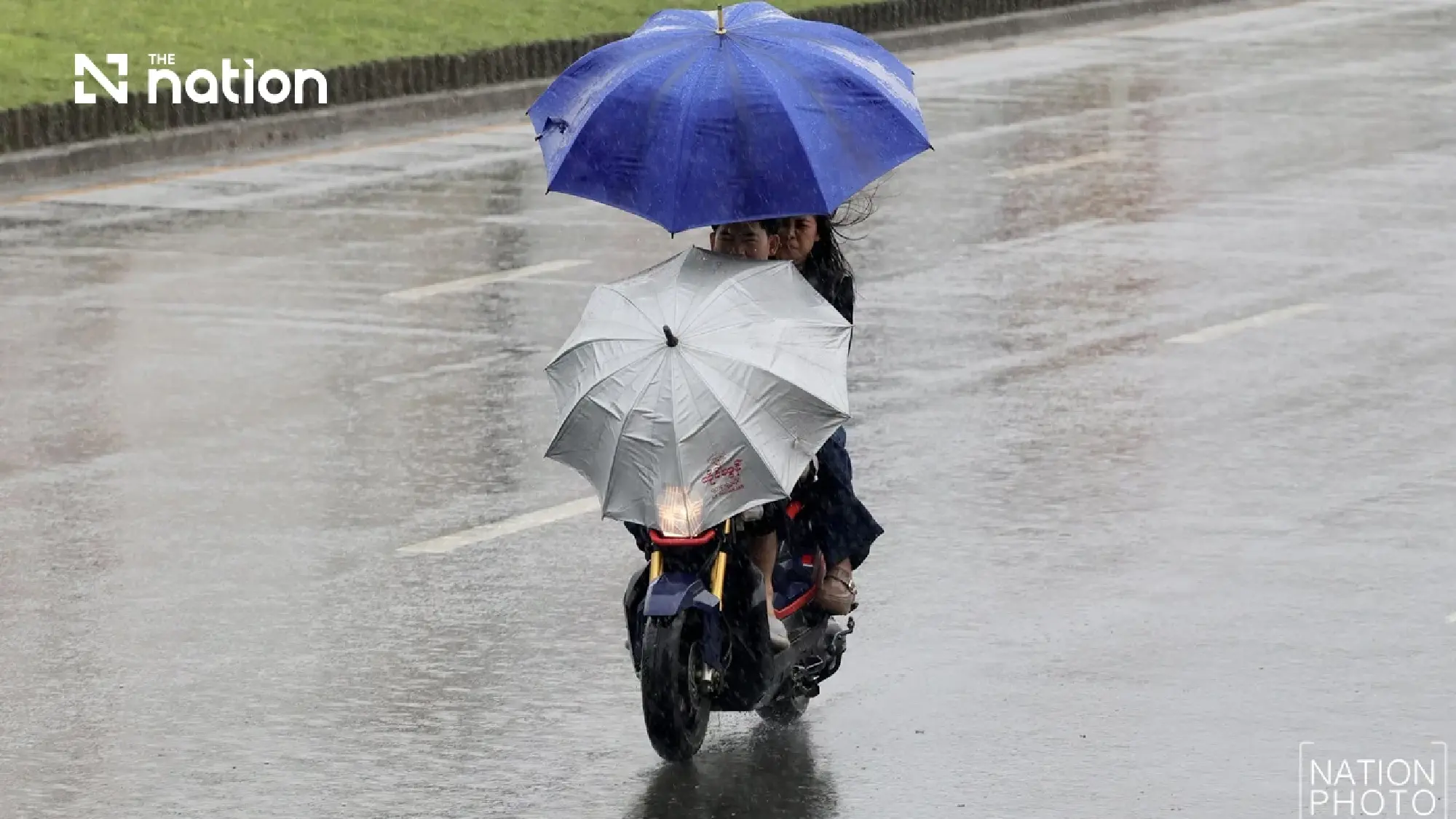 Monsoon downpours put four Thai regions on flood alert