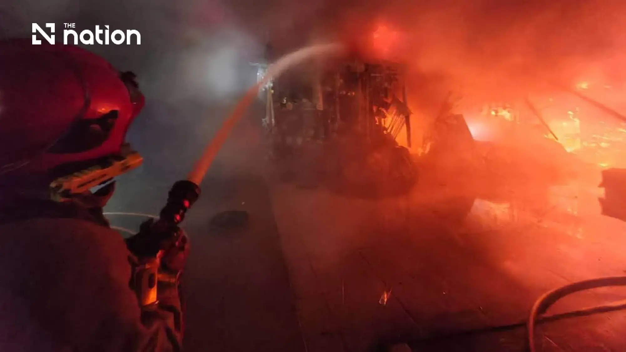 Khlong Thom roof subsides as crews fight fire from outside