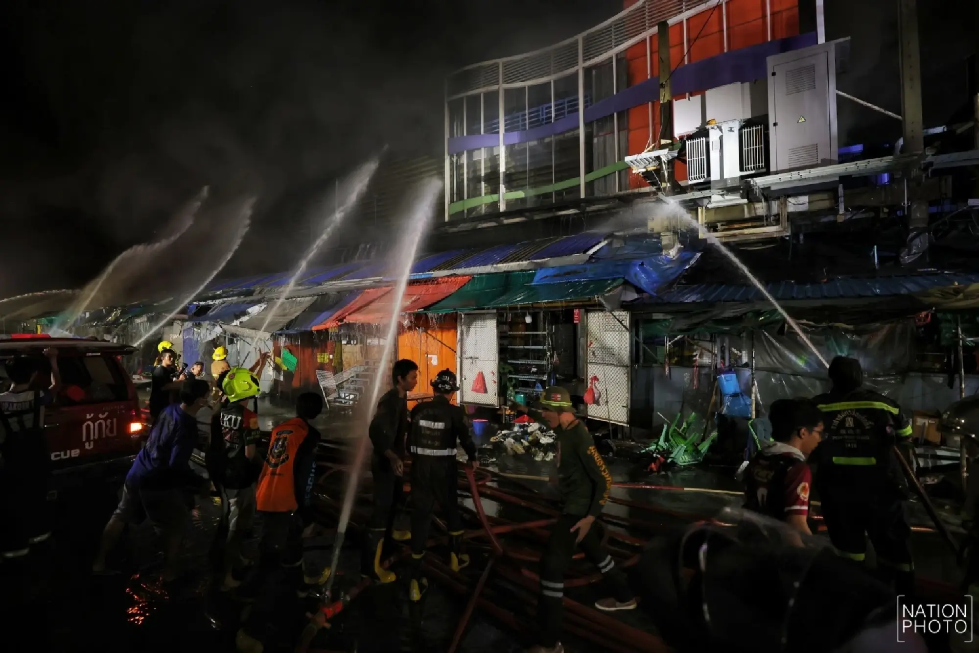 Khlong Thom roof subsides as crews fight fire from outside