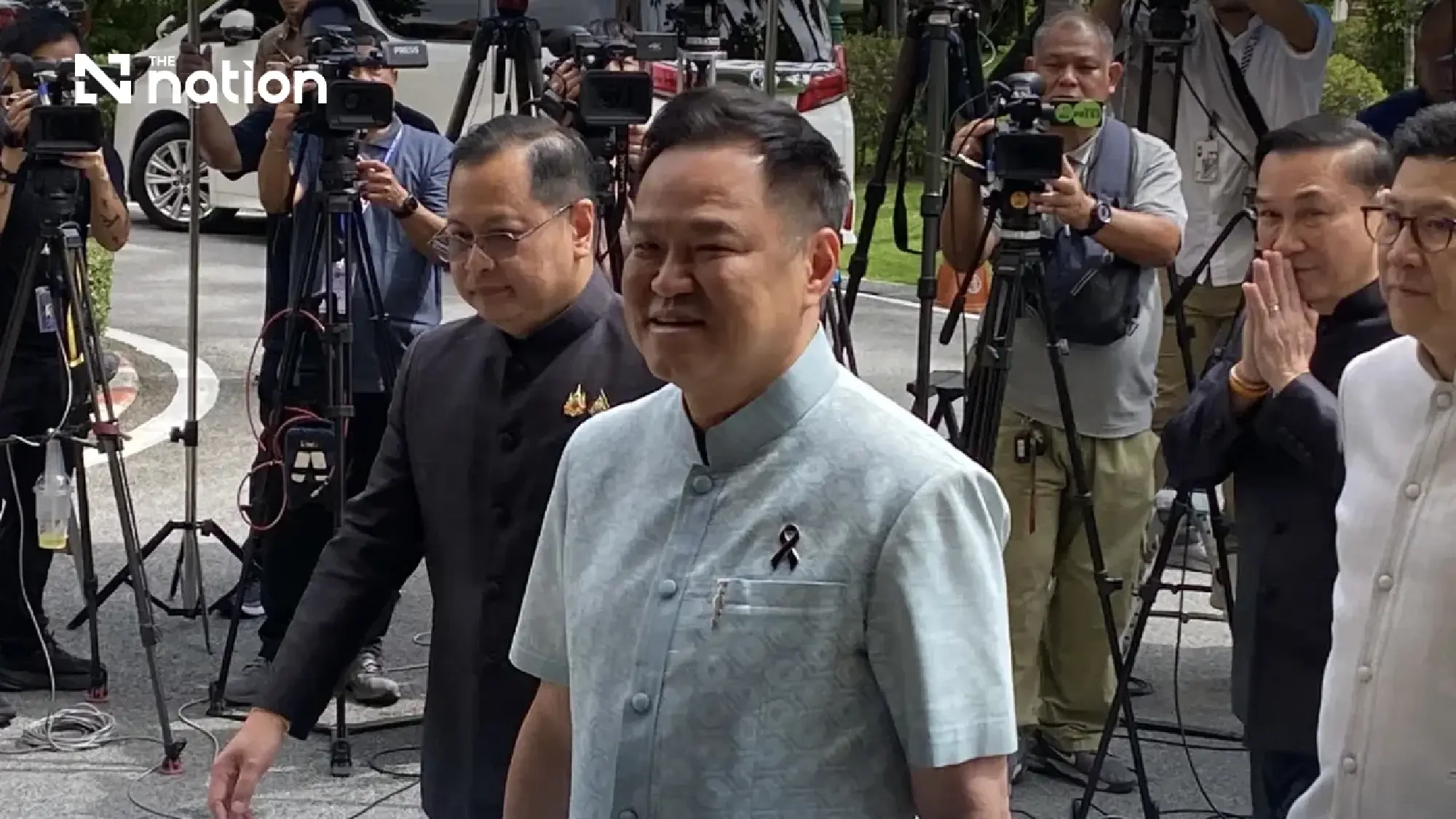 Prime Minister and Interior Minister Anutin Charnvirakul (centre)