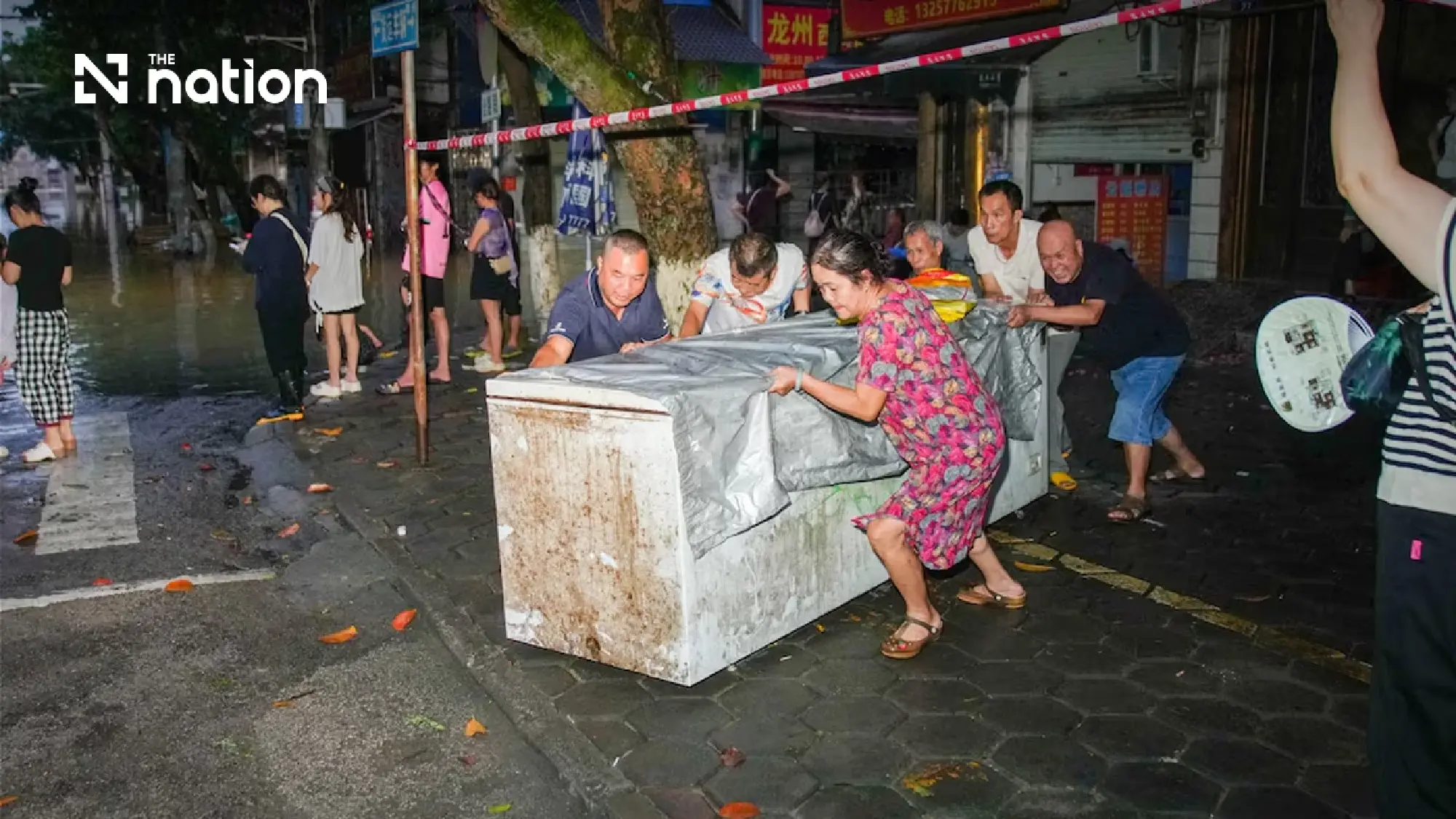 Tens of thousands evacuated in China as Storm Narra moves inland