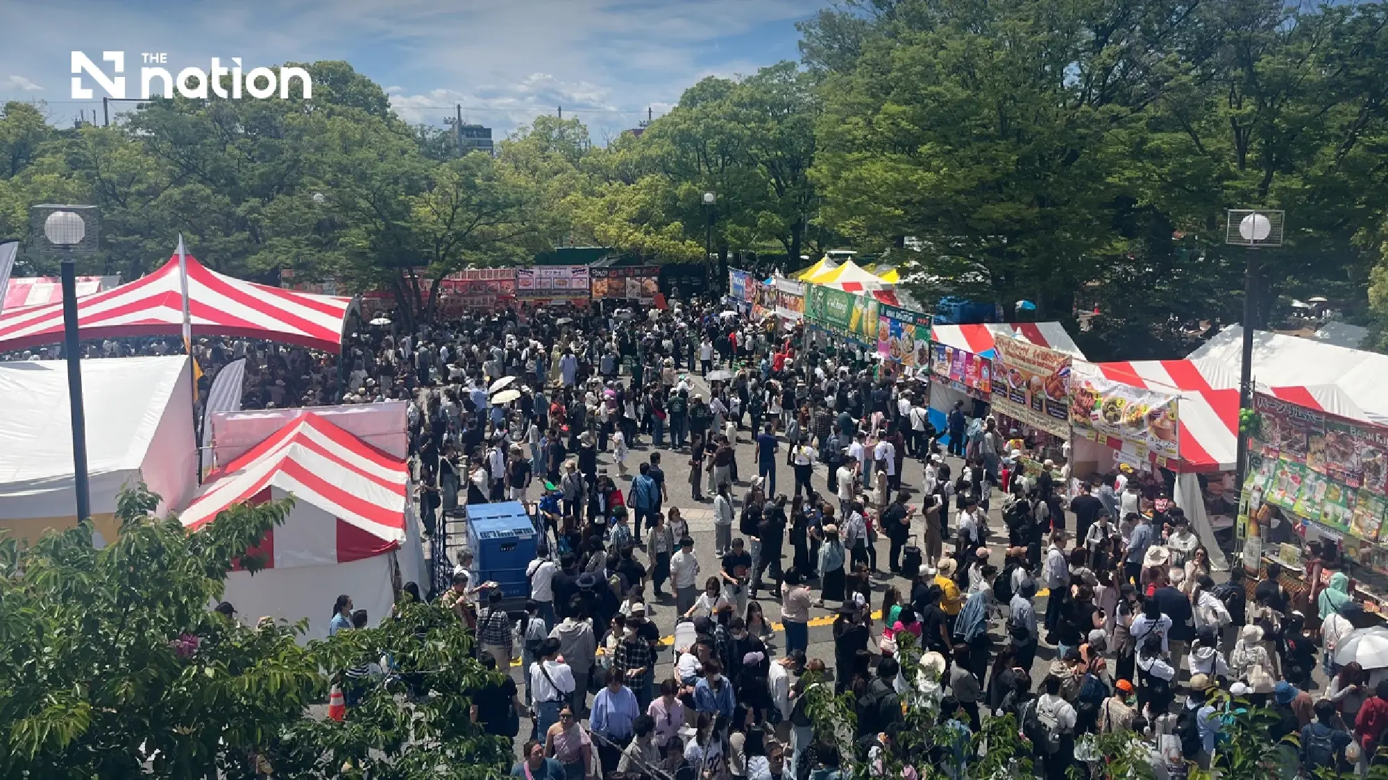 Visitors crowd the food area at Thai Festival Tokyo 2026 in Yoyogi Park on May 9. (c) Jiji Press