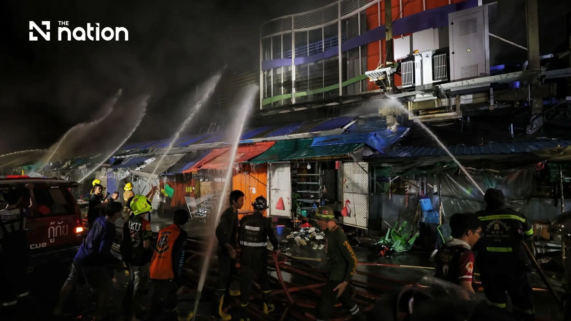 Khlong Thom roof subsides as crews fight fire from outside