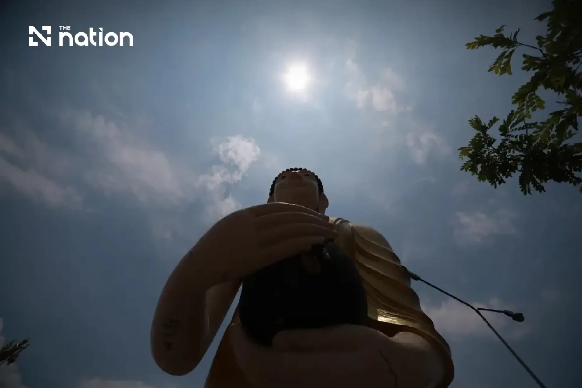 Bangkok’s overhead sun creates a shadowless effect across the capital