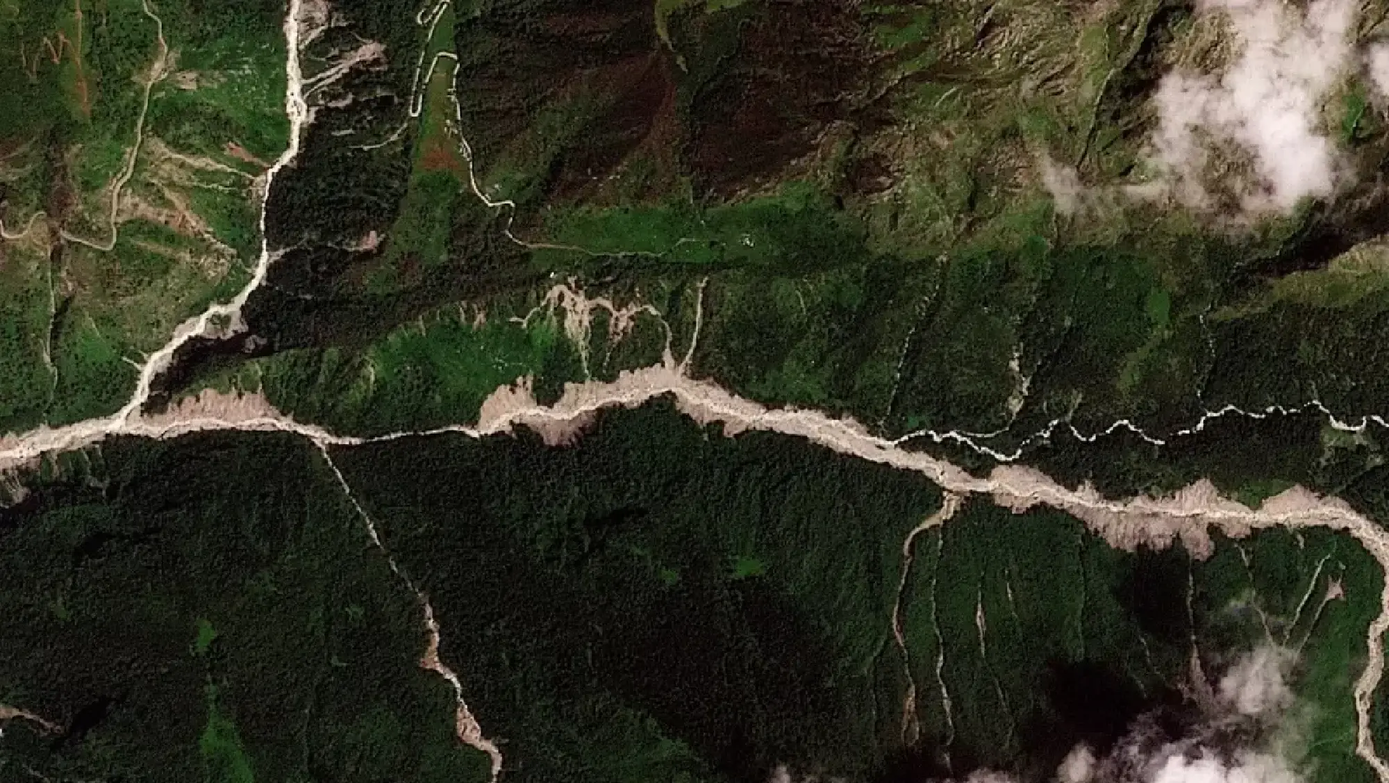 At least 160 killed in Nepal-China floods and mudslides, hundreds missing
