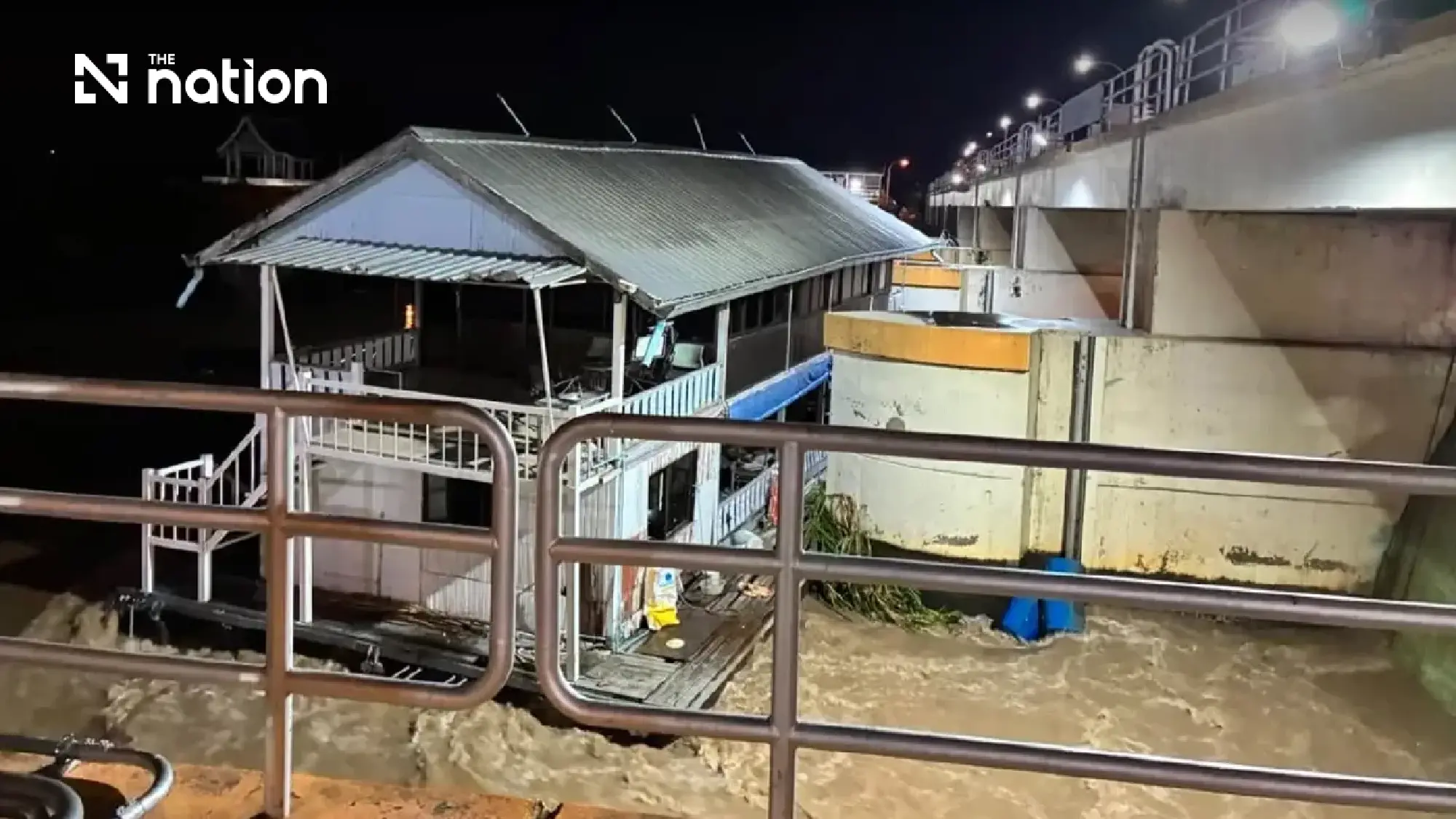 Mae Klong on red flood alert as runaway raft slams into dam gate