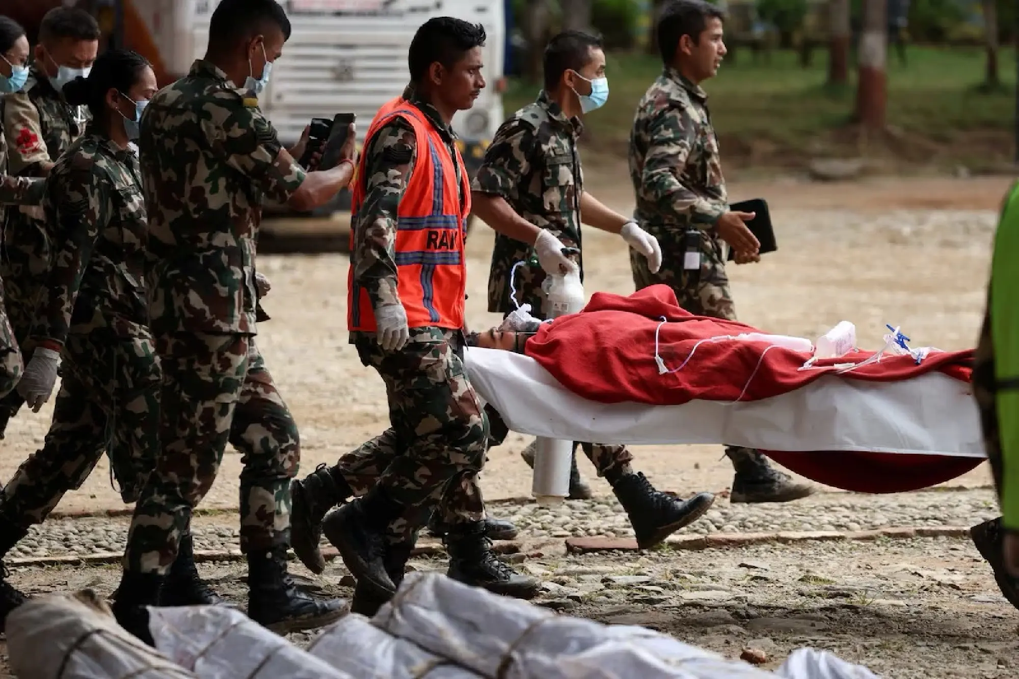 Nepal foreman rescued after nine days in flooded tunnel says he stayed behind to help colleagues escape