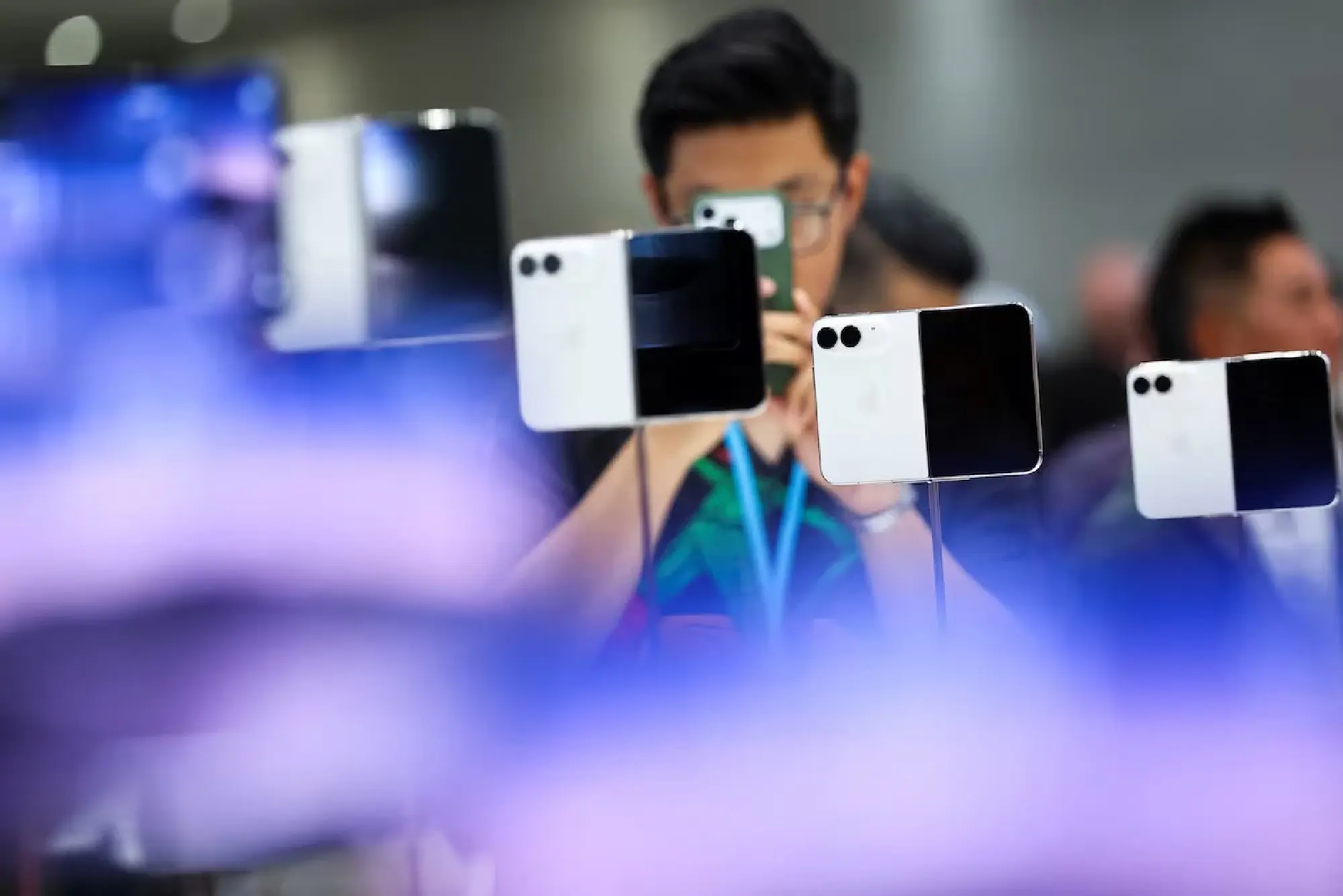 Apple joins foldable phone race with $1,999 passport-shaped iPhone Duo