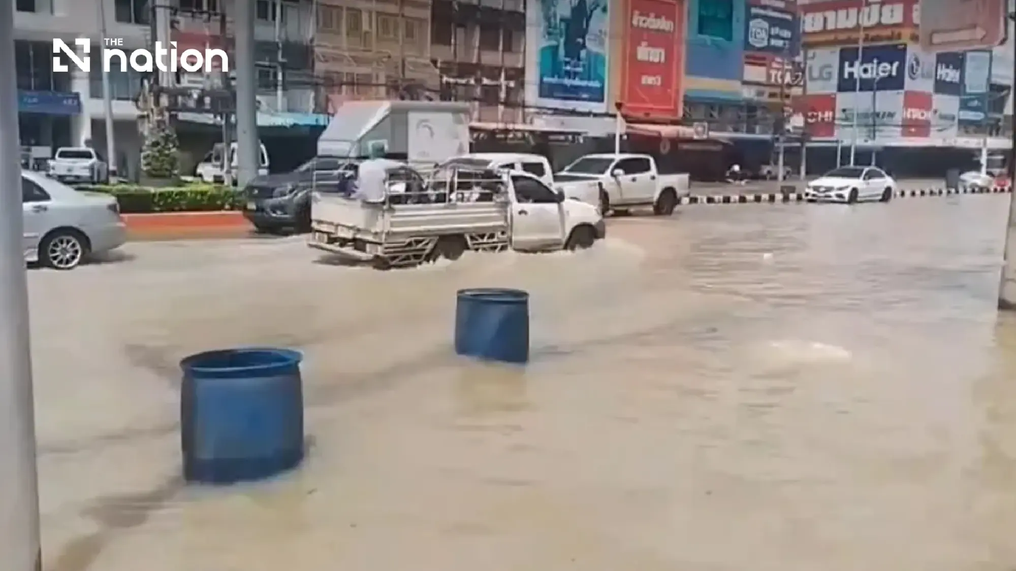 Rayong business district flooded as Khlong Thap Ma overflows