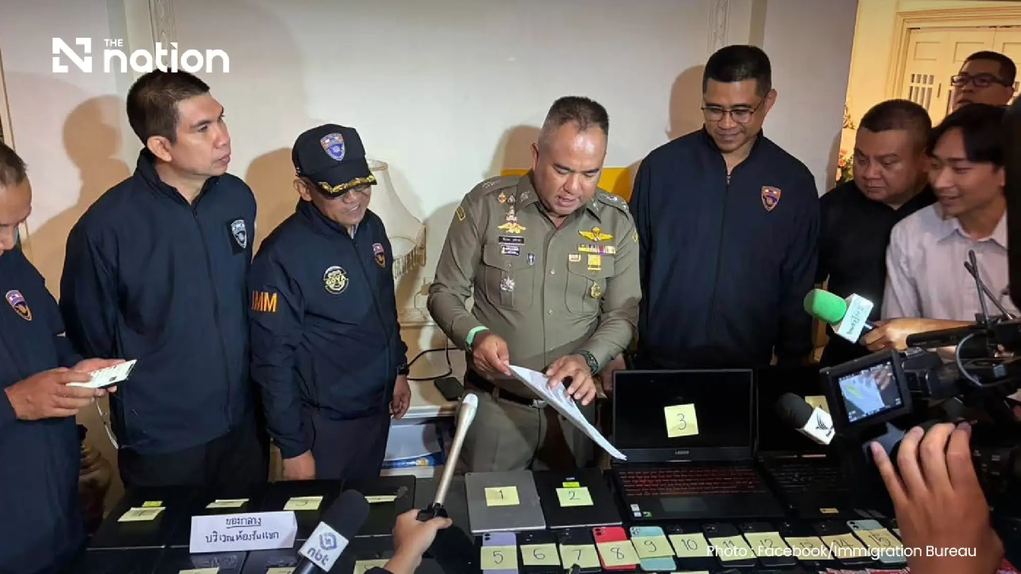 Police detain 14 in scam raid at Bangkok mansion worth over THB270m