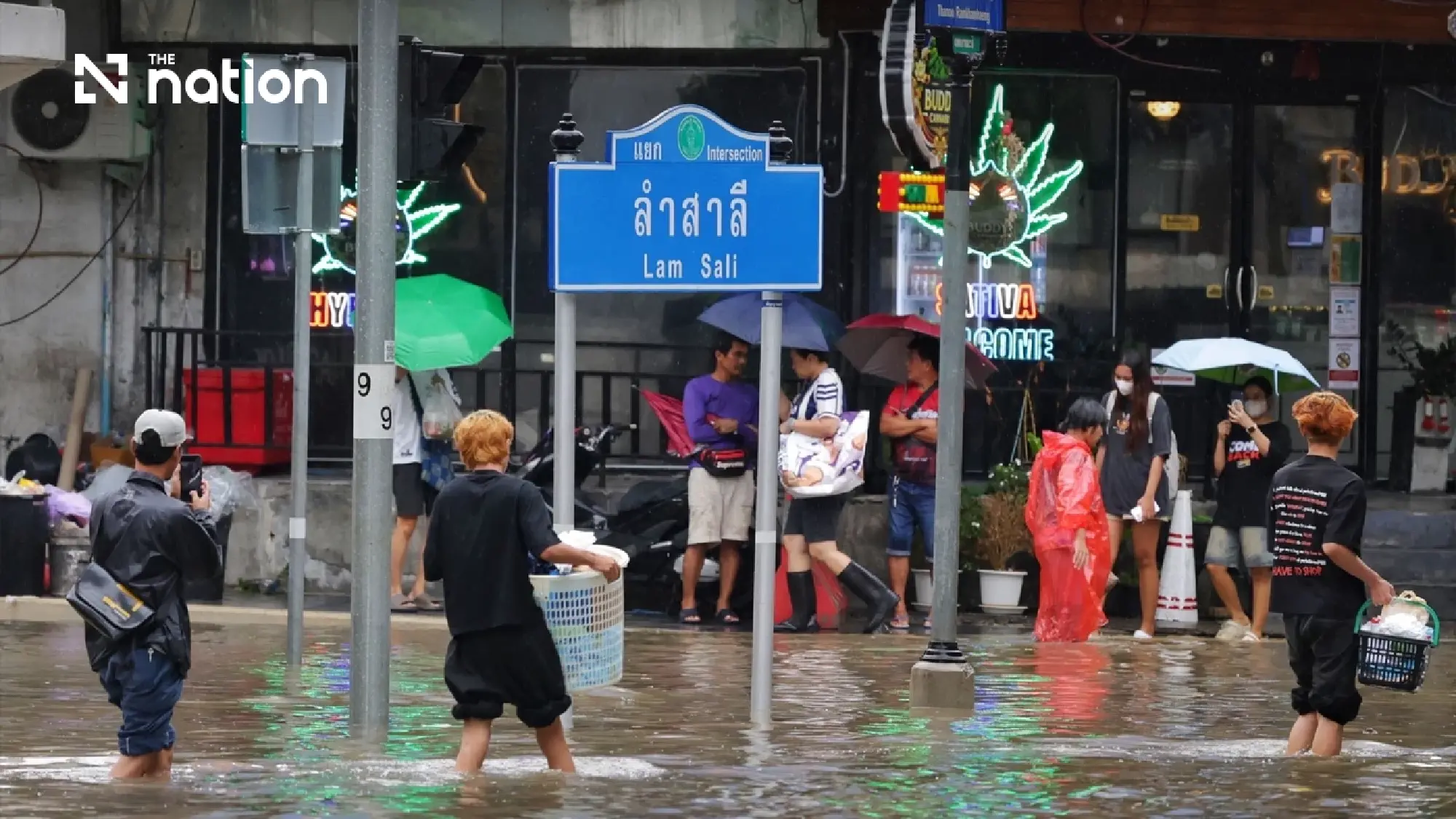 Floods block small cars on Bangkok’s Lat Phrao as storms forecast across 80% of area