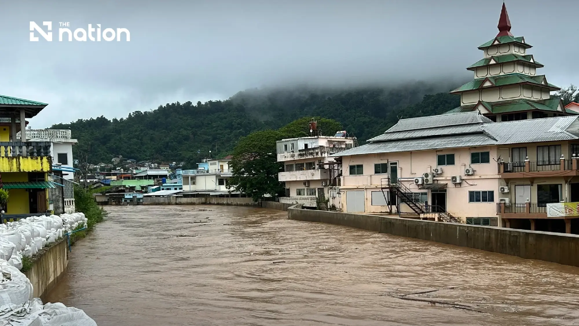 Chiang Rai flood alert after Mae Sai River reaches bridge underside