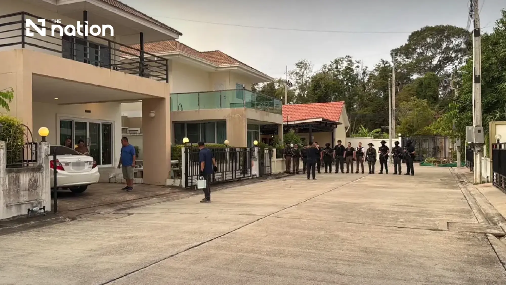 Son’s pleas end 18-hour standoff with Thai police officer