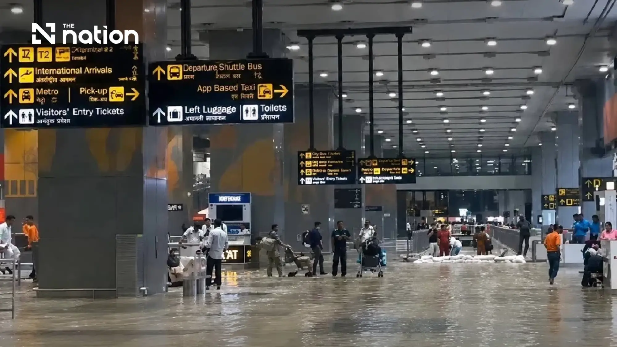 Delhi storms divert nine flights and flood airport roads