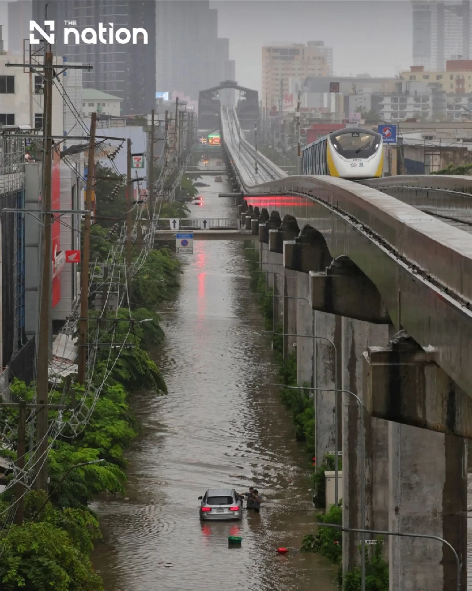 Floods block small cars on Bangkok’s Lat Phrao as storms forecast across 80% of area