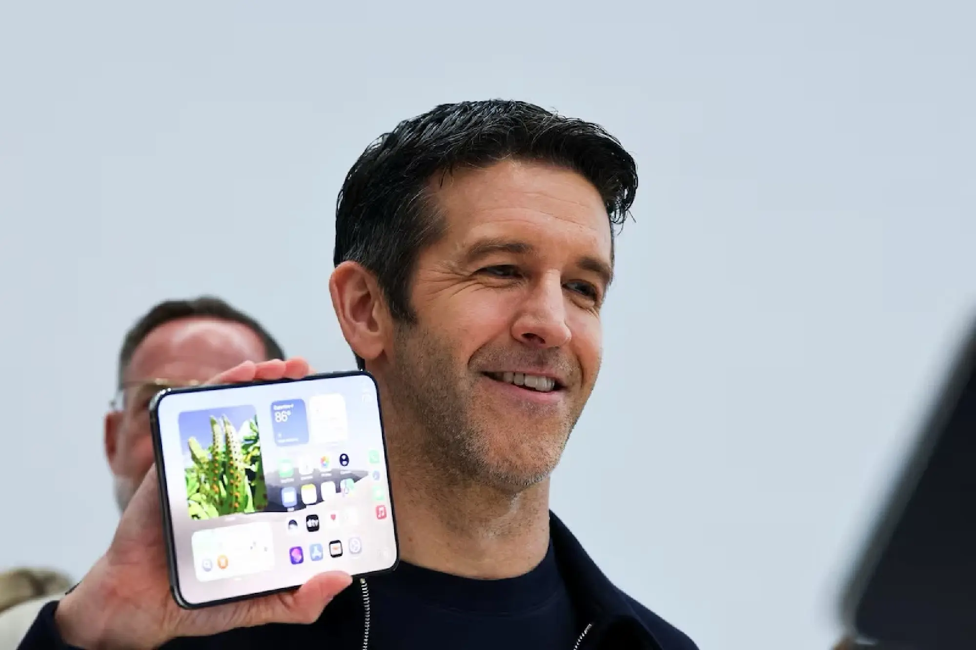 Apple joins foldable phone race with $1,999 passport-shaped iPhone Duo