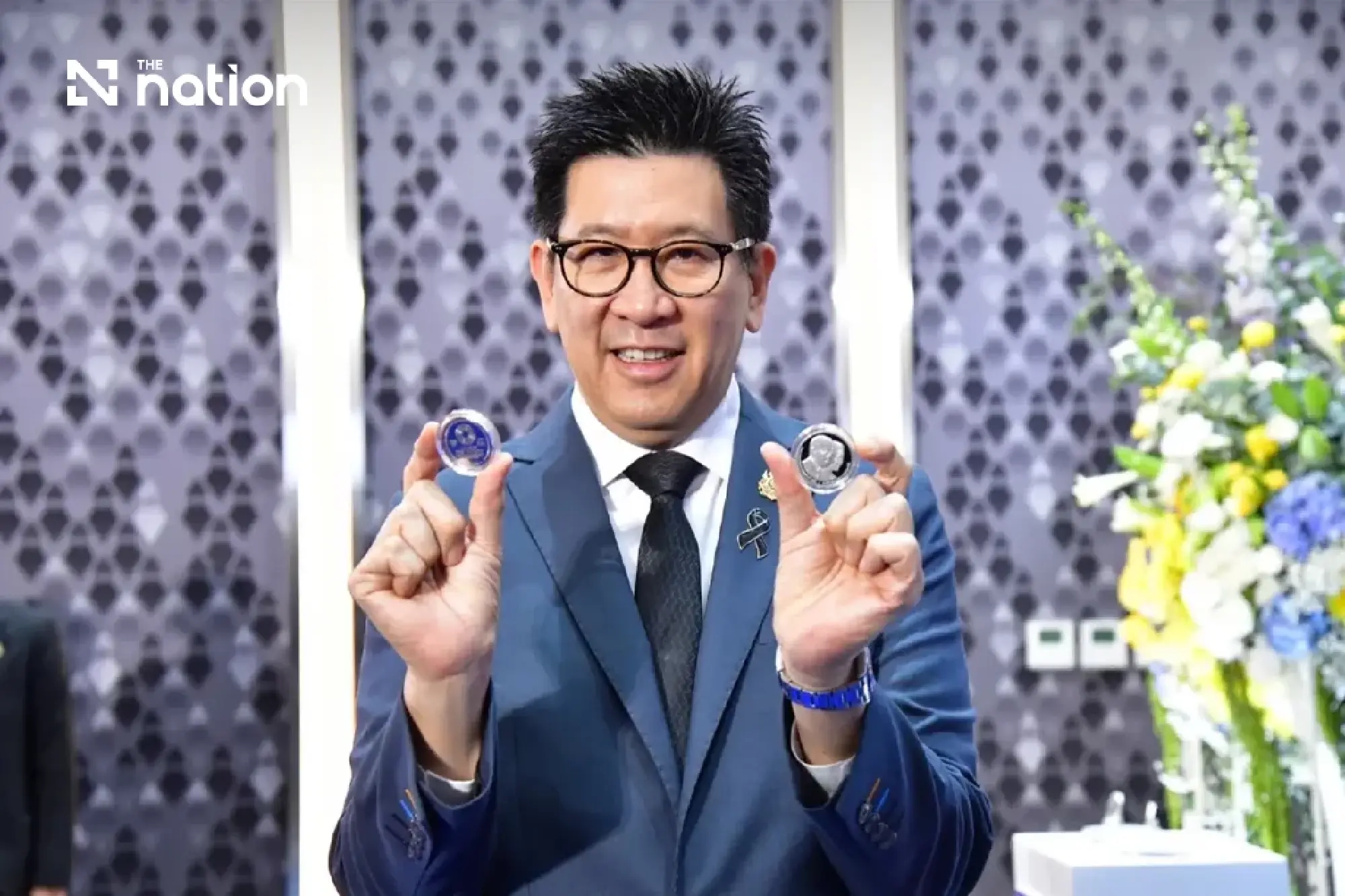 Thailand unveils IMF-World Bank commemorative coins