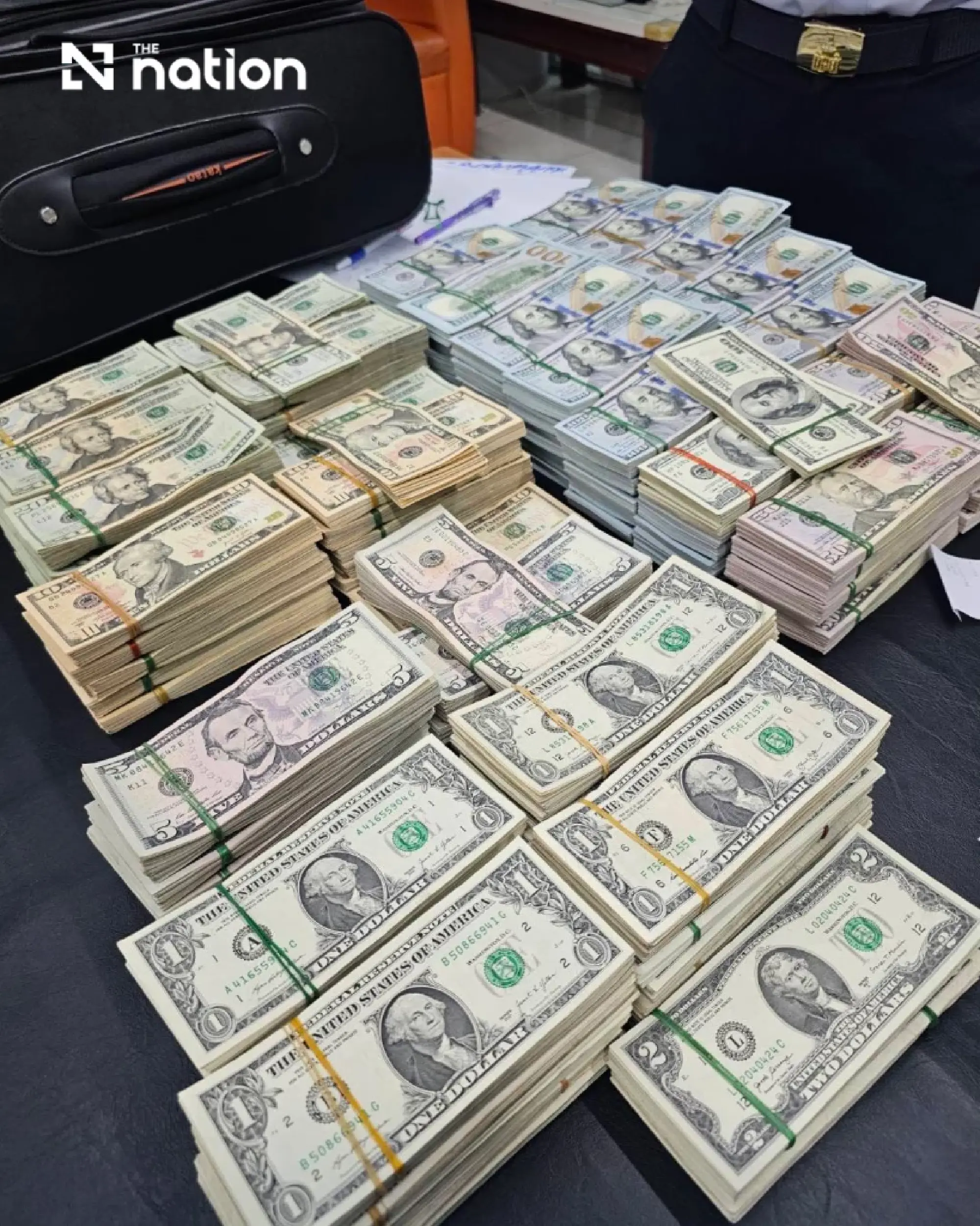 Thai customs arrests 2 foreign passengers with US cash worth over 56m baht