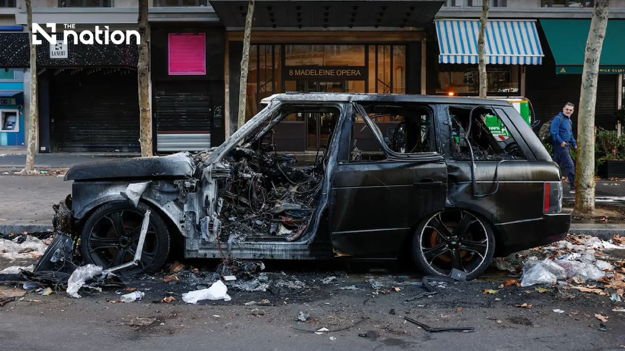 Macron condemns ‘shocking’ violence in France and orders review after 2,400 arrests