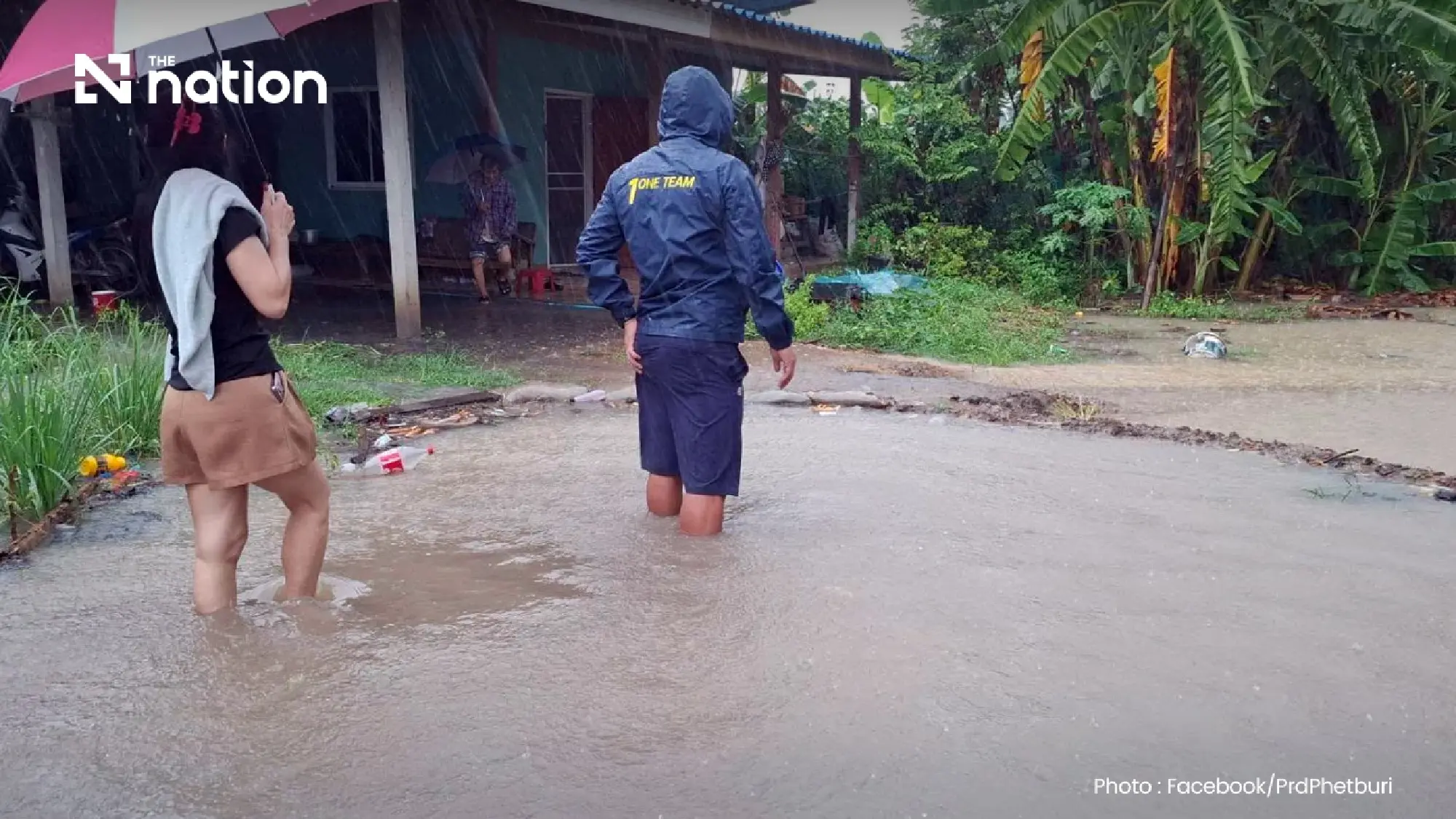 Rescuers evacuate bedridden patients as overnight floods hit almost 100 homes in Phetchaburi