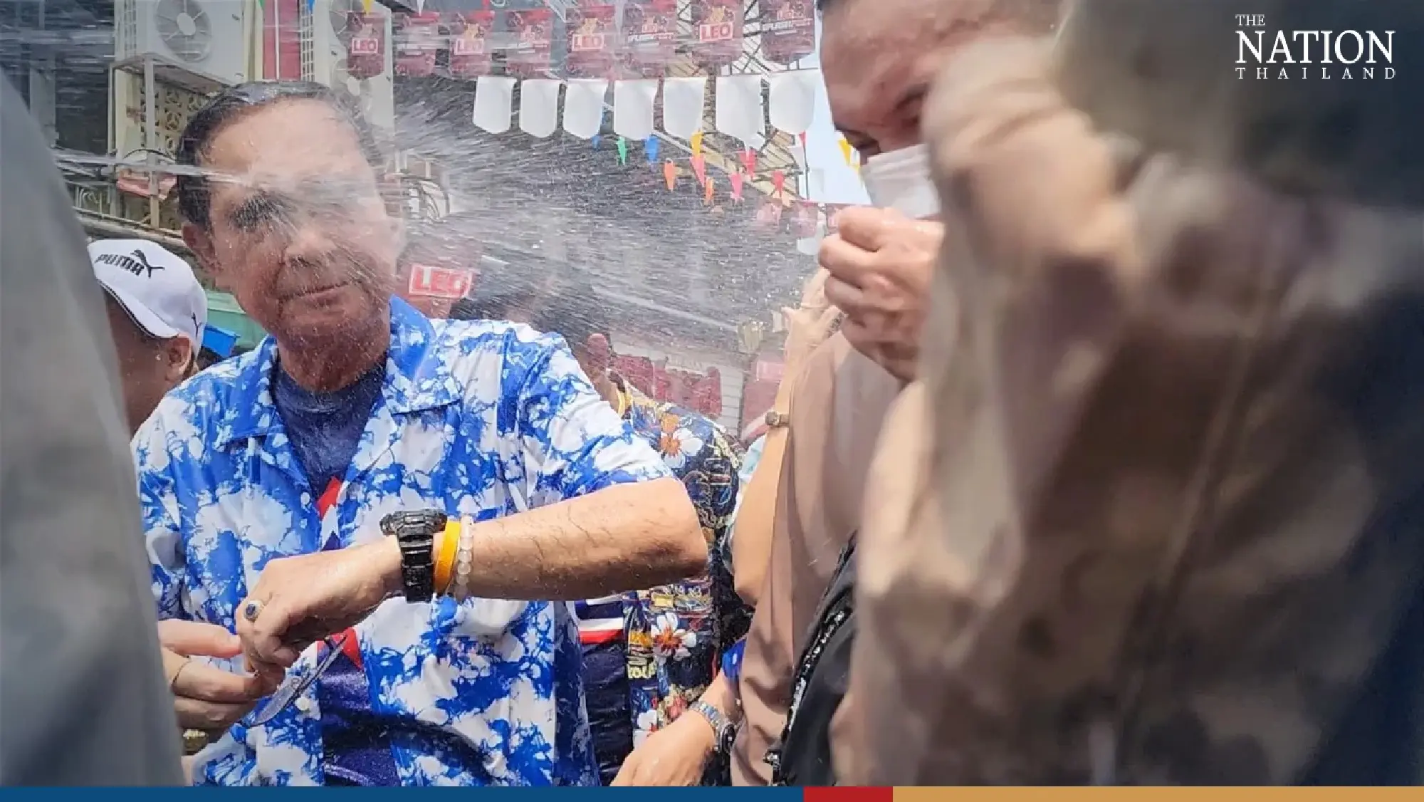 Armed with a water gun, Thai PM joins battle on Khao San Road - Photo 5