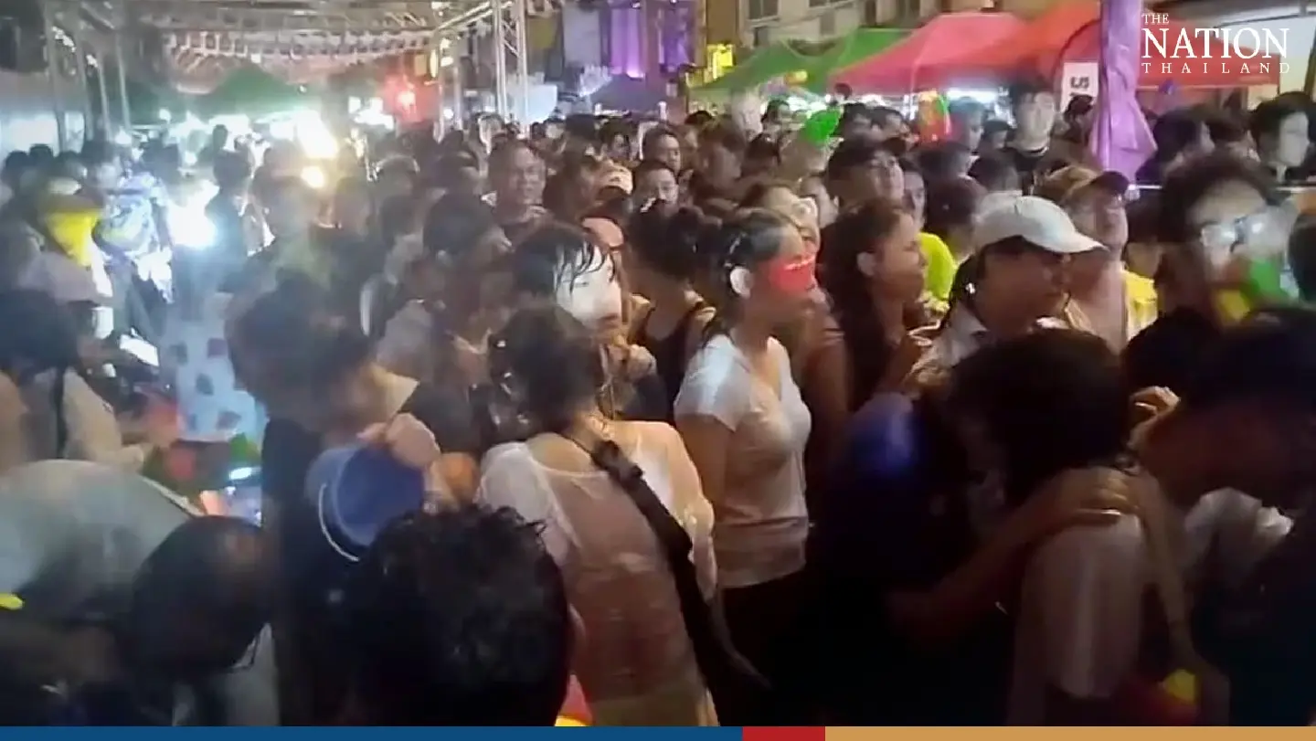 Police stop partygoers entering crowded Khao San on first day of Songkran - Photo 3