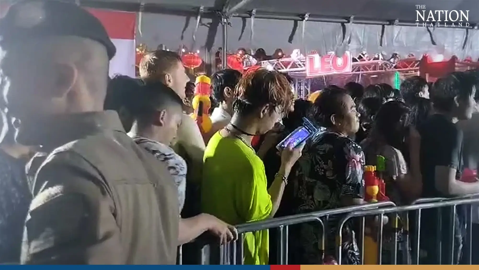 Police stop partygoers entering crowded Khao San on first day of Songkran - Photo 6
