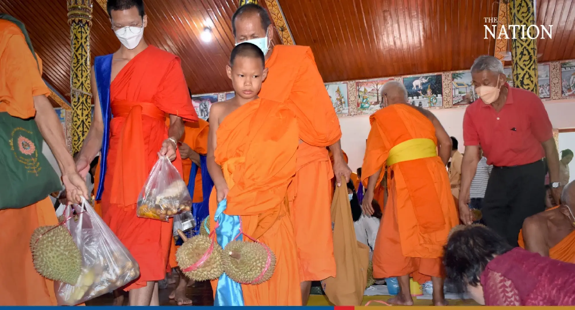 Uttaradit's unique temple tradition — making merit by offering durians - Photo 3