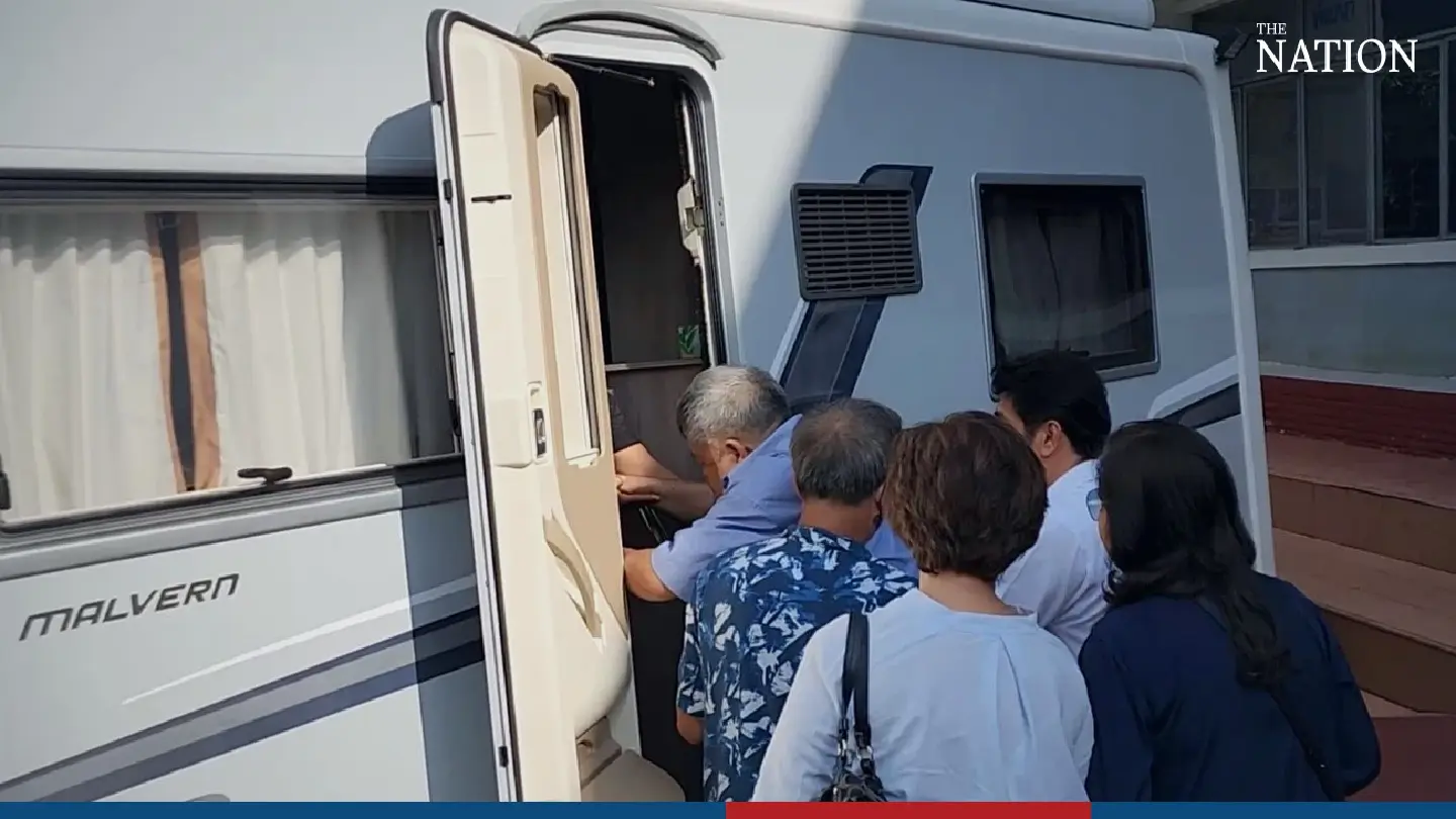 Tycoon Premchai zips off in camper van upon release from prison - Photo 2