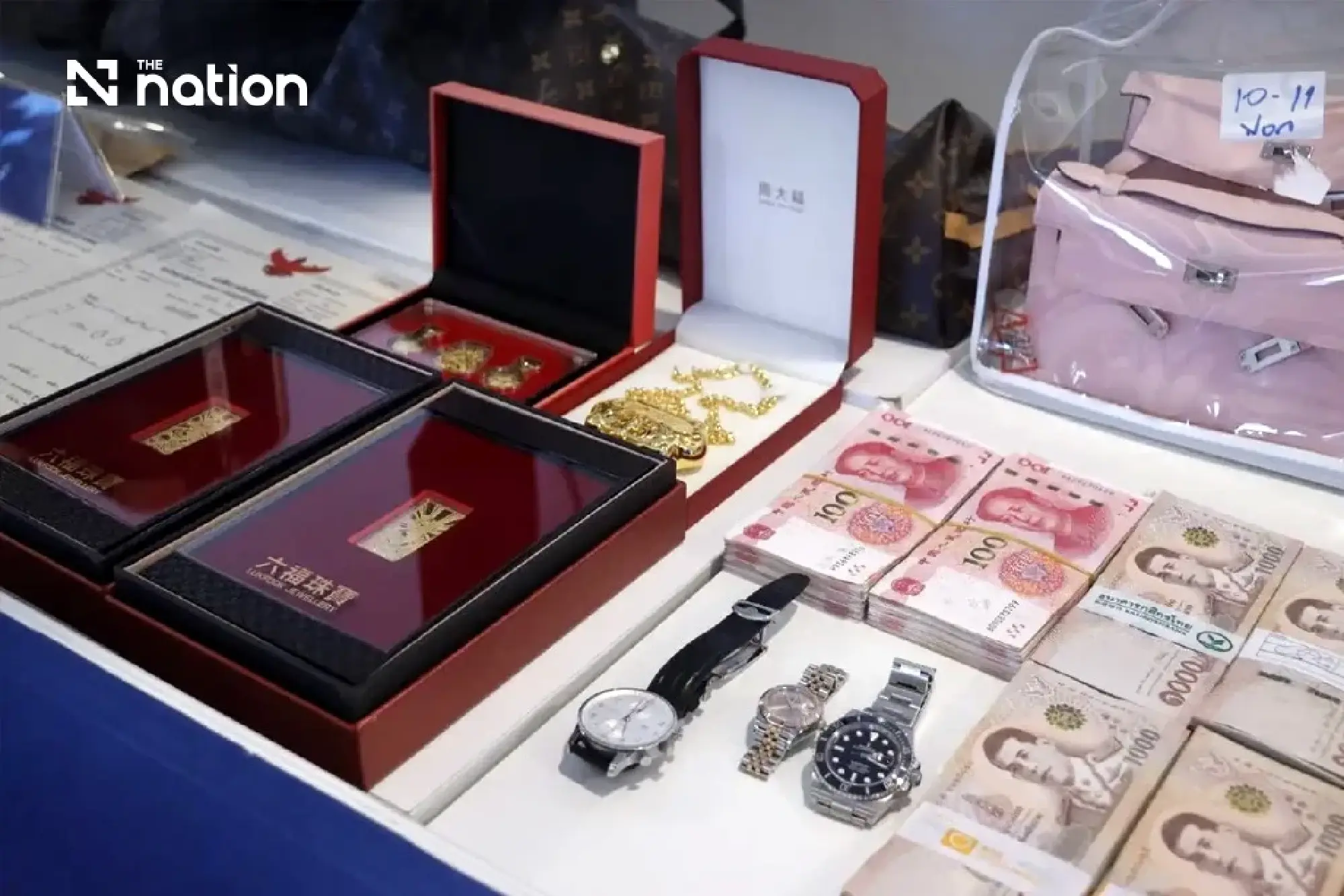 Thai police seize over 500 million baht in scam probe - Photo 6