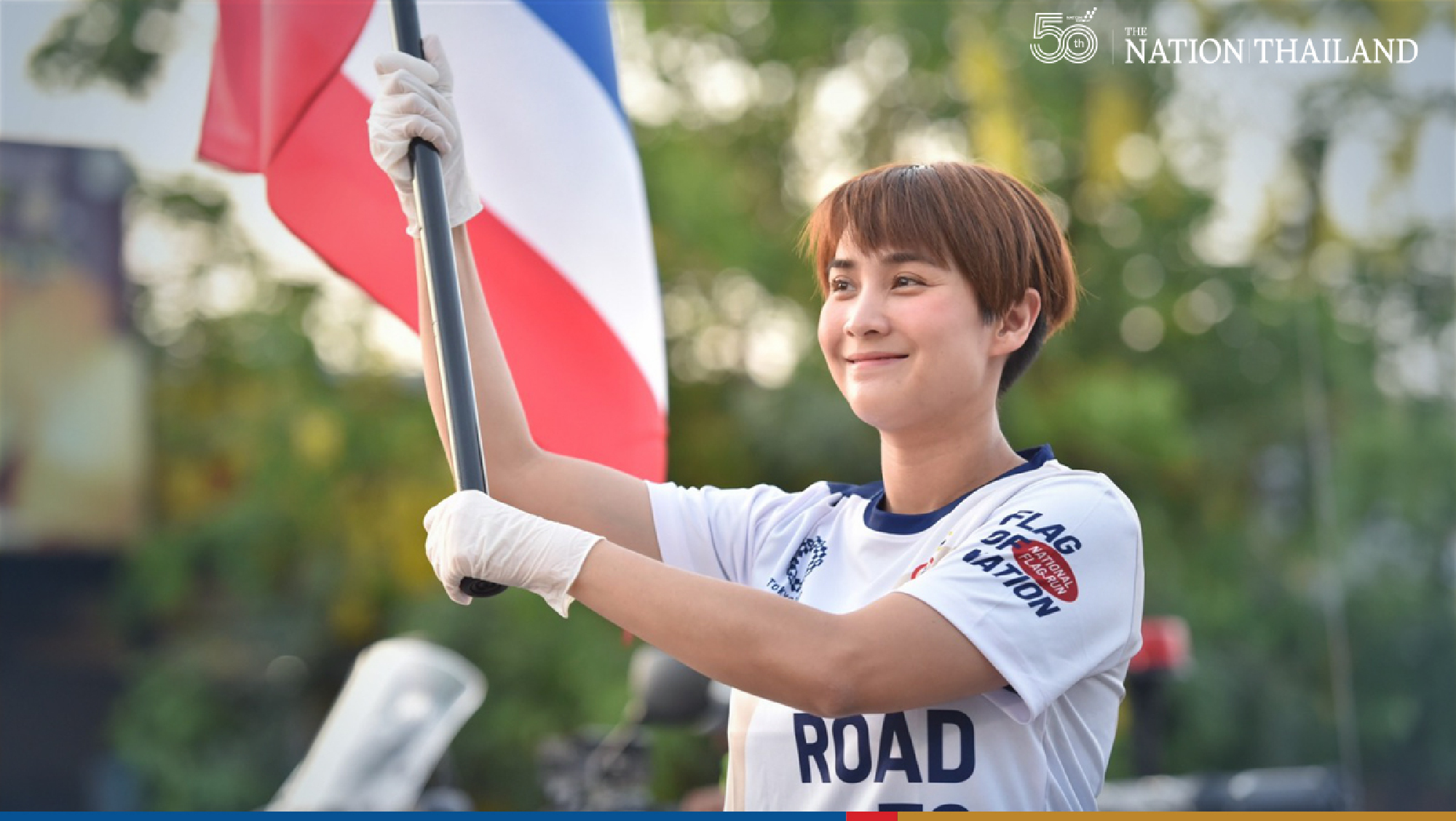 Olympic medal-winners add shine to the ‘Flag of Nation’ relay