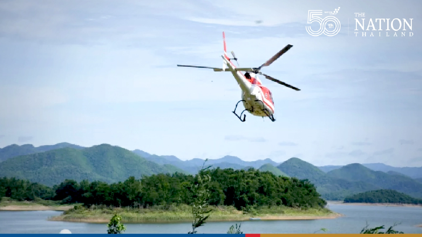 Forest encroacher fires at Phetchaburi National Park helicopter Forest encroacher fires at Phetchaburi National Park helicopter