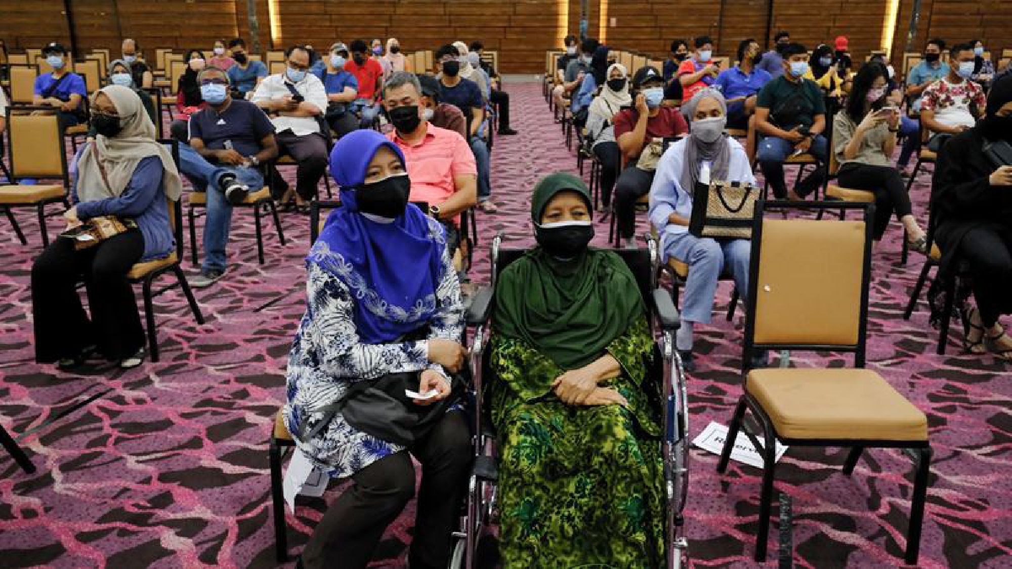 Malaysia PM under pressure as anger builds on covid surge