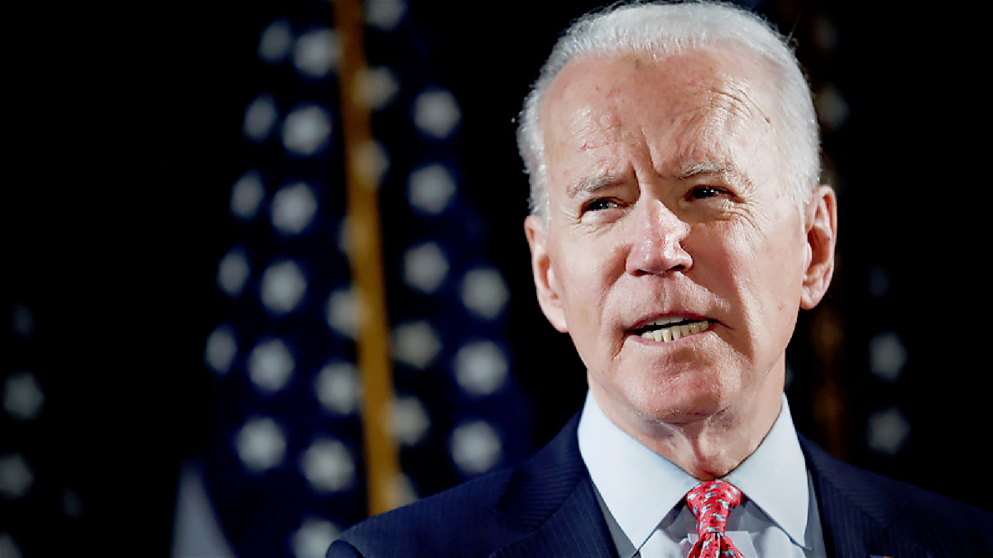Biden sets new vaccine goals as White House grapples with its message
