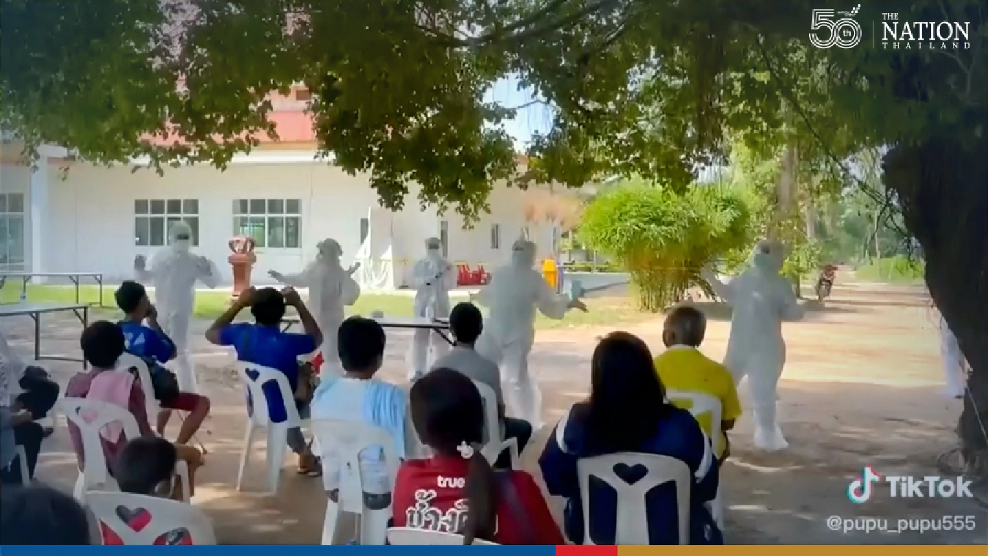 Health workers cheer up country with dance for quarantined village