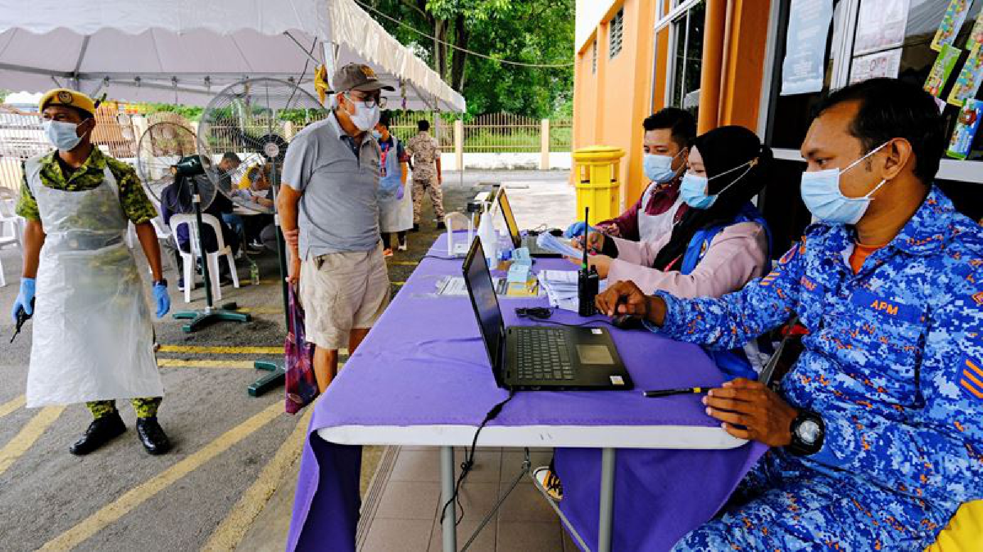 Malaysia announces rules to reduce movements in virus fight