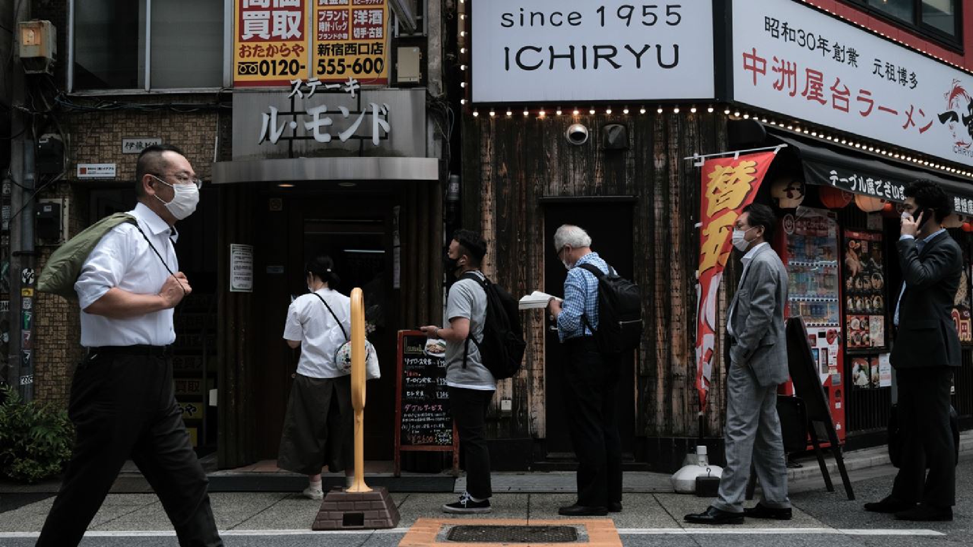 Japan to end Tokyo virus emergency about a month before Olympics