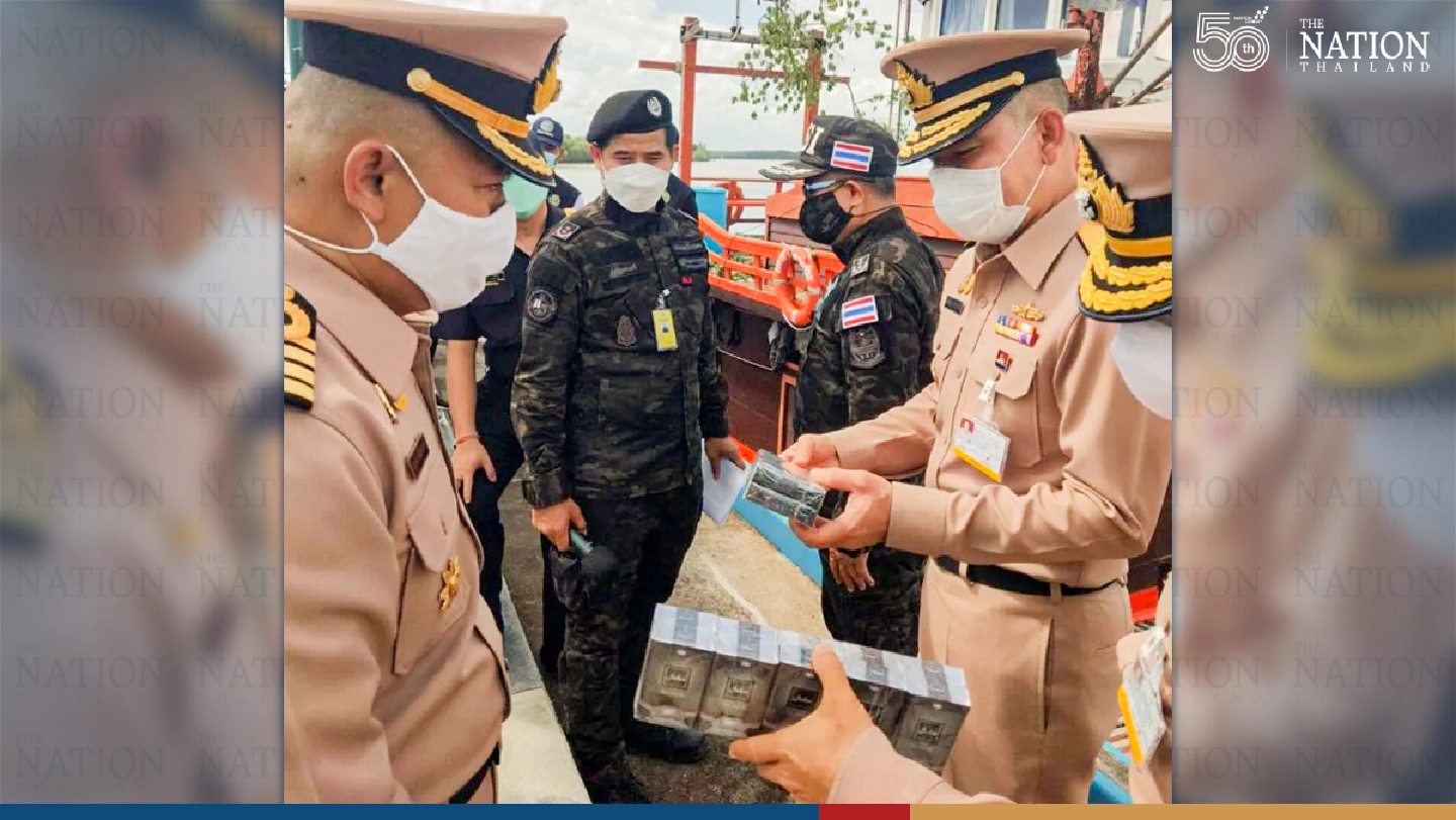 DSI, Navy team swoops down on ship with cargo of smuggled cigarettes in Trang